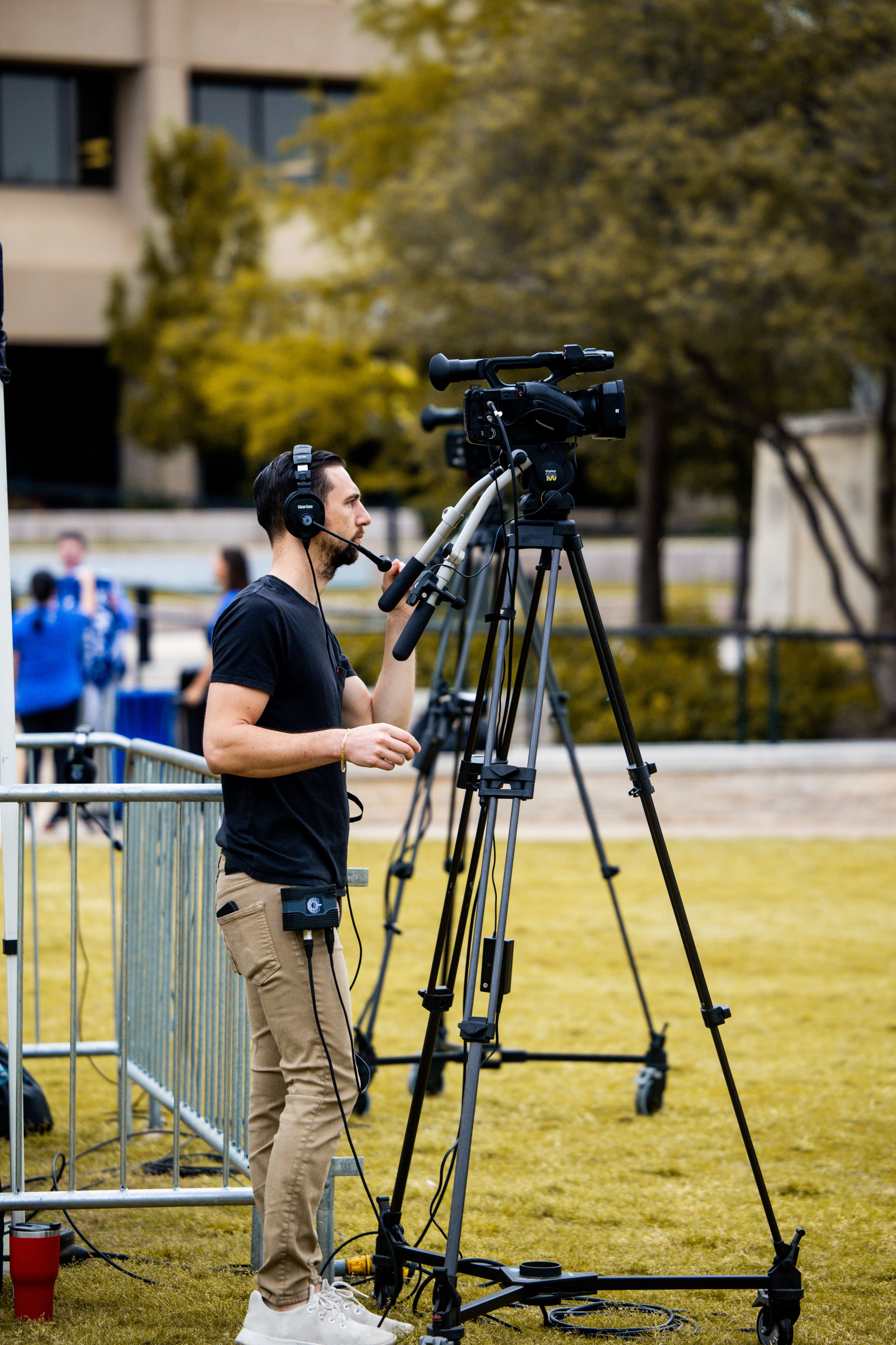 Cameraman Filming Outdoors Event with Professional Equipment · Free ...