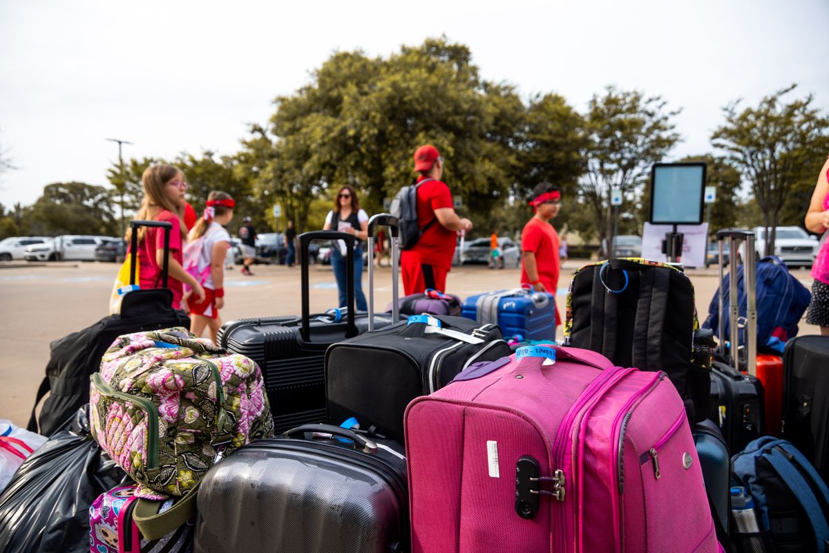 Suitcases stacked together after a flight