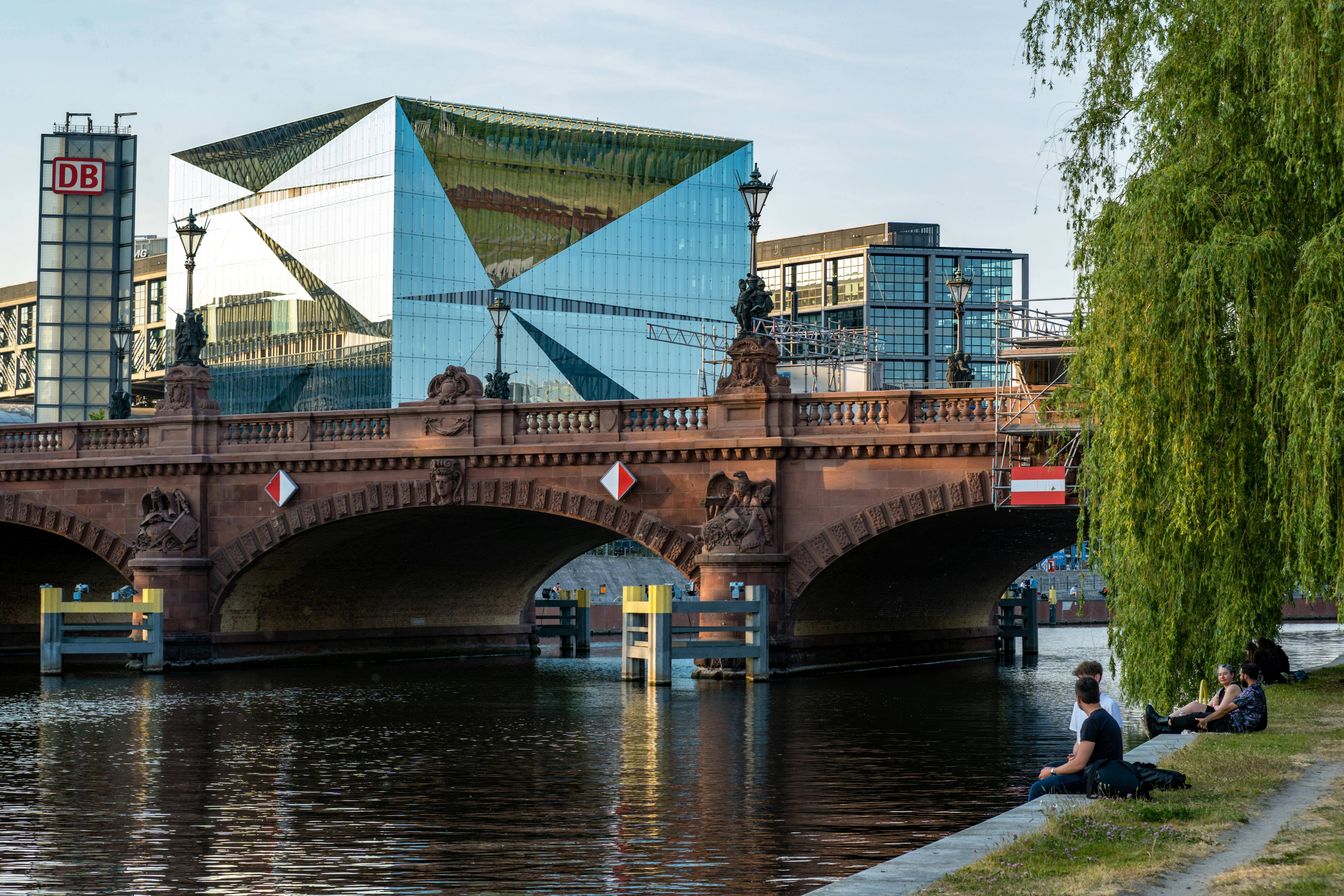 An elegant blend of modern and historic architecture by the river in Berlin, Germany.