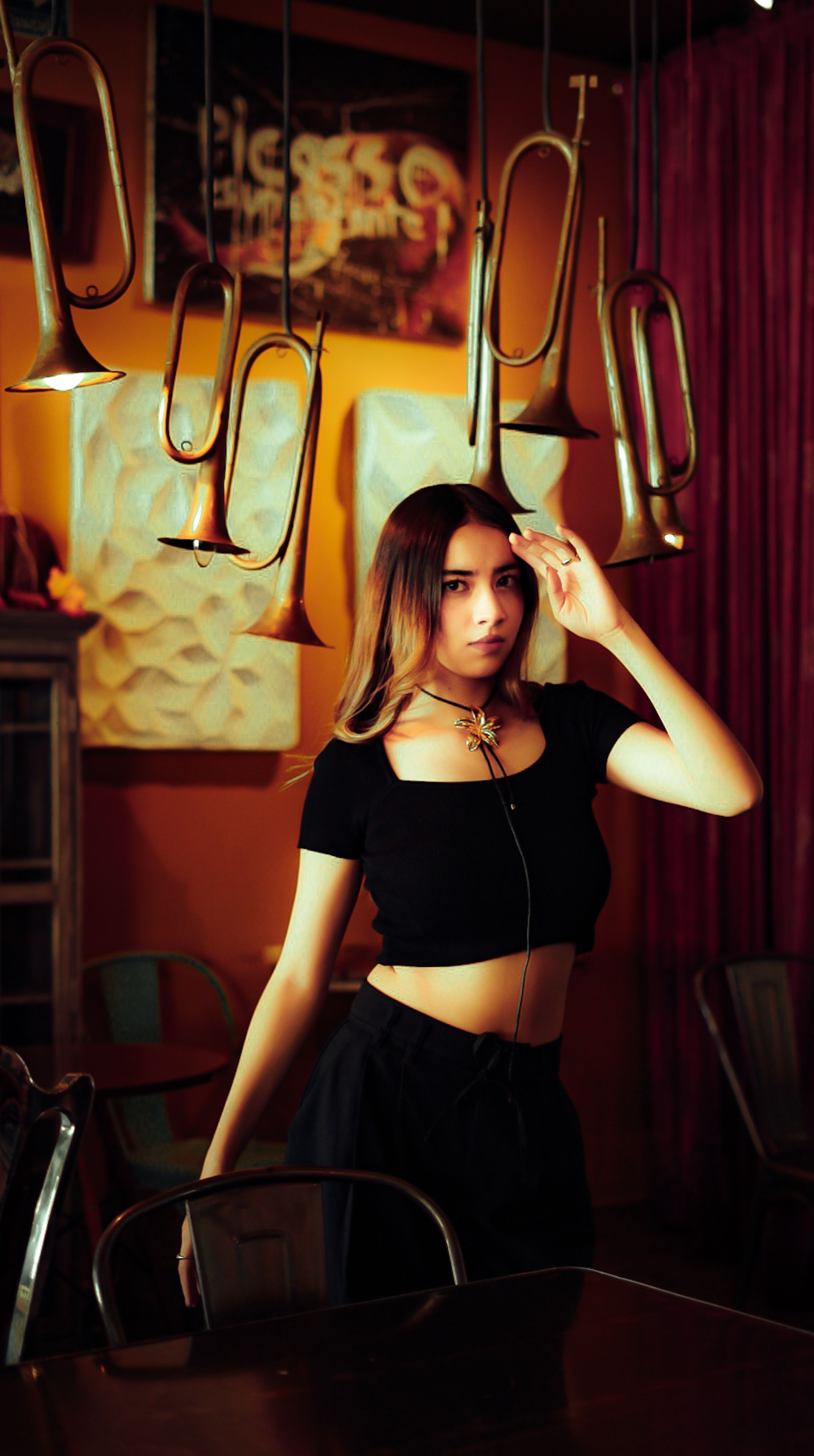 Stylish Woman in Artistic Indoor Setting · Free Stock Photo