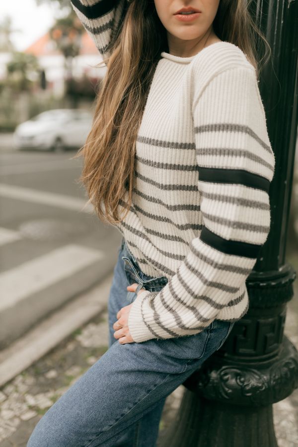 Ecru off-white jeans with striped sweater