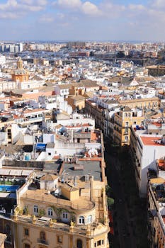 Aerial view showcasing Seville's historic buildings and vibrant cityscape.