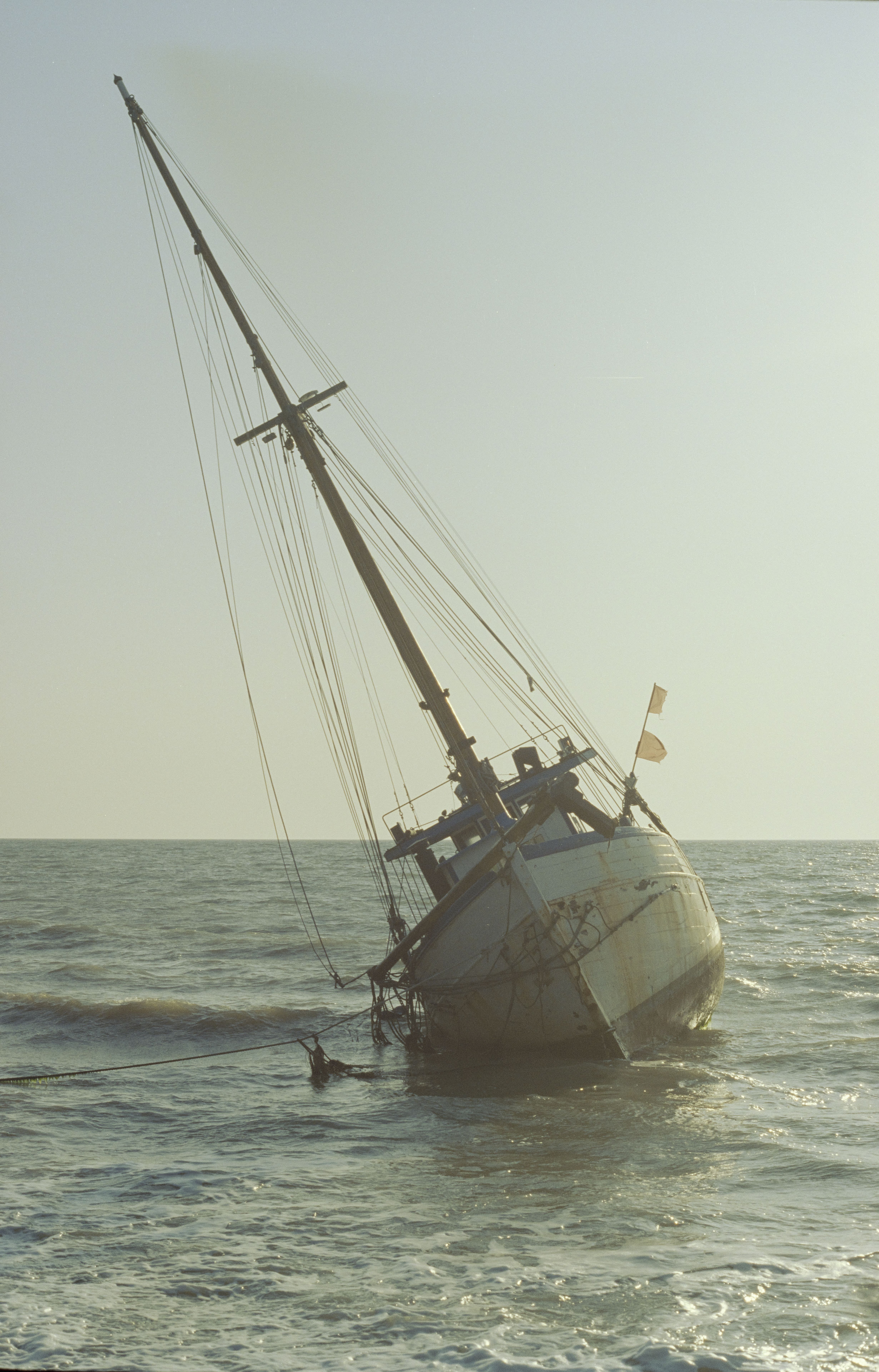 A vintage shipwreck off the coast of Snaptun, Denmark captured in a retro style.