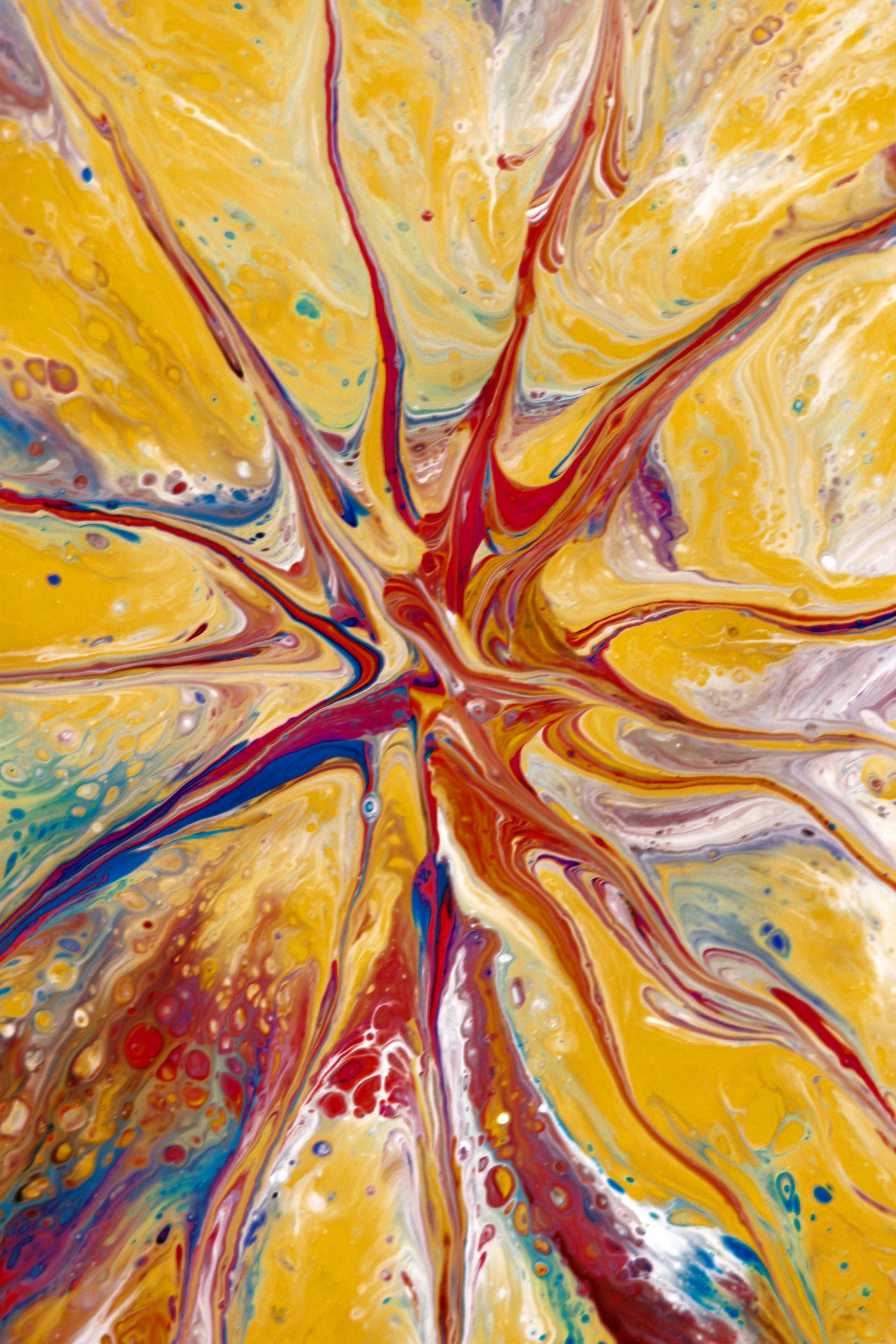 Vibrant Abstract Paint Pouring Art in Yellow Hues · Free Stock Photo