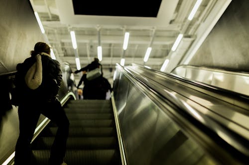 Person on Escalator