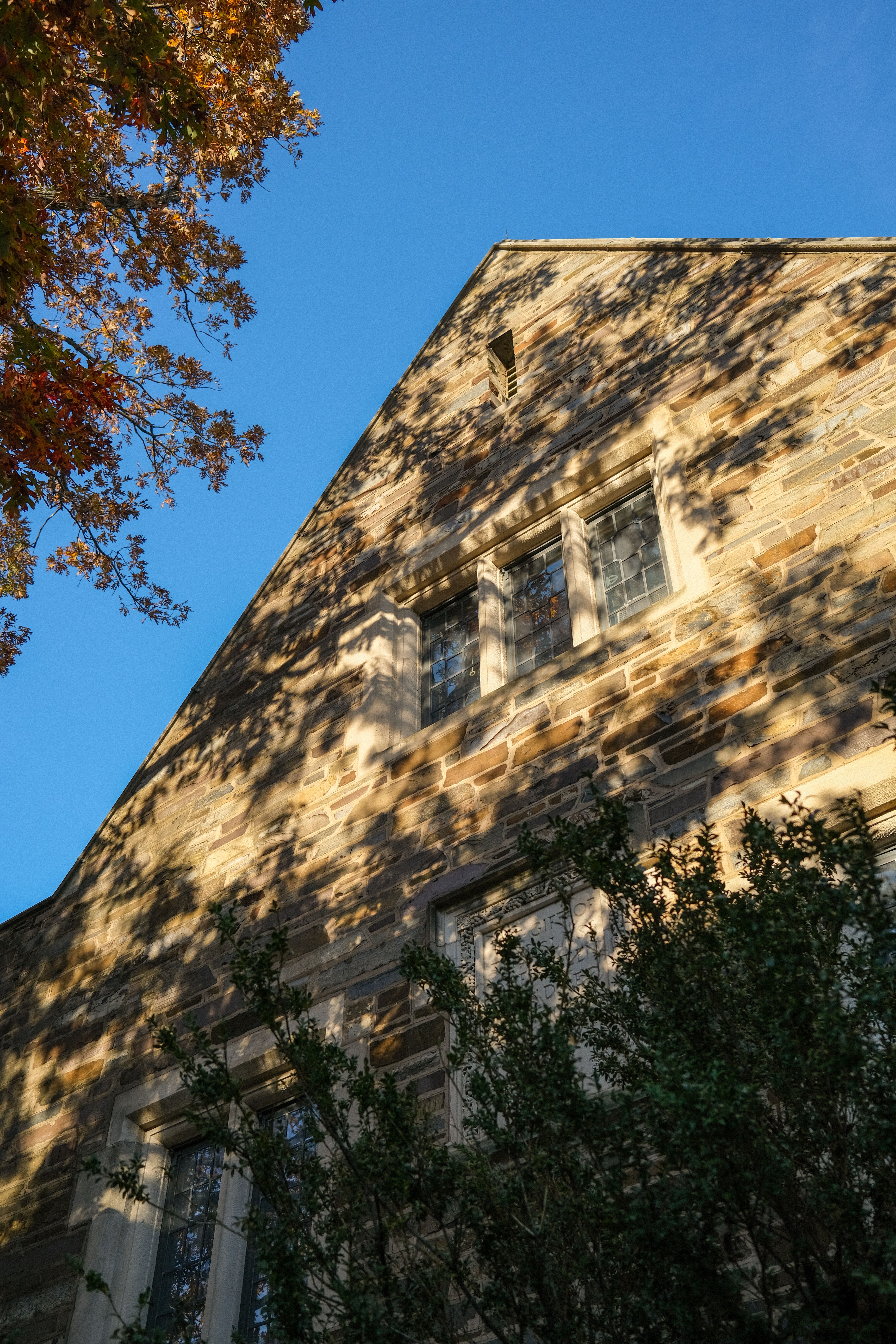 Historic Stone Building with Autumn Foliage · Free Stock Photo