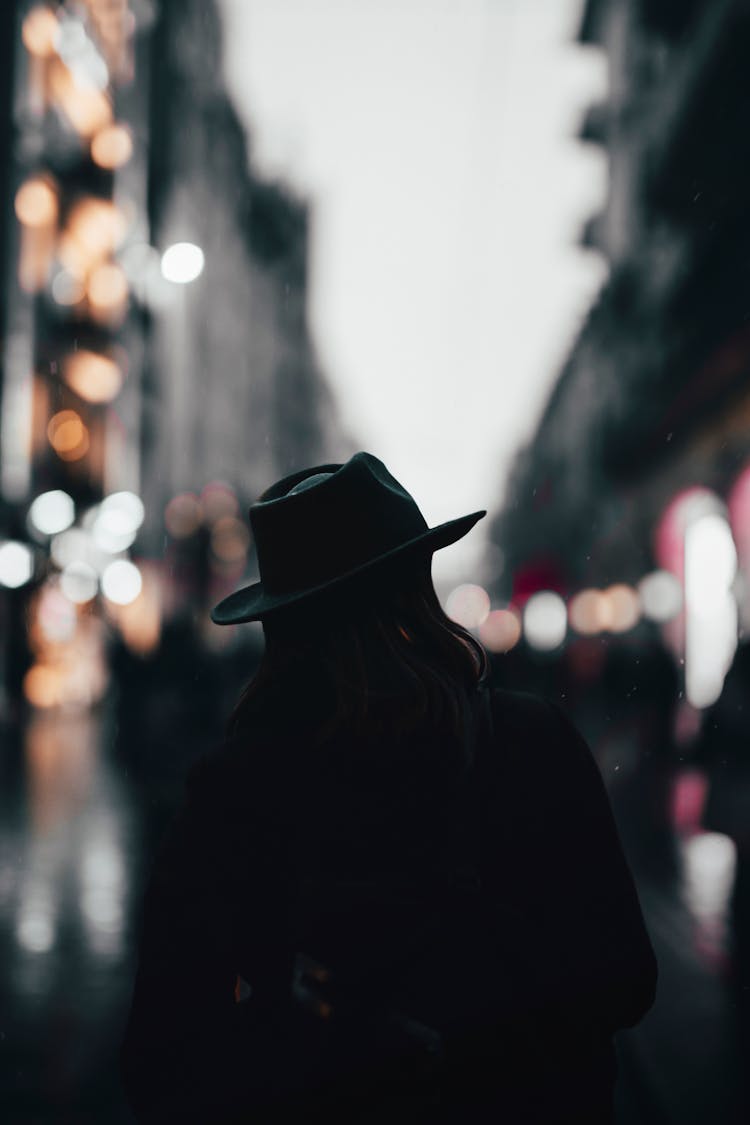 Silhouette Of A Man Wearing Hat