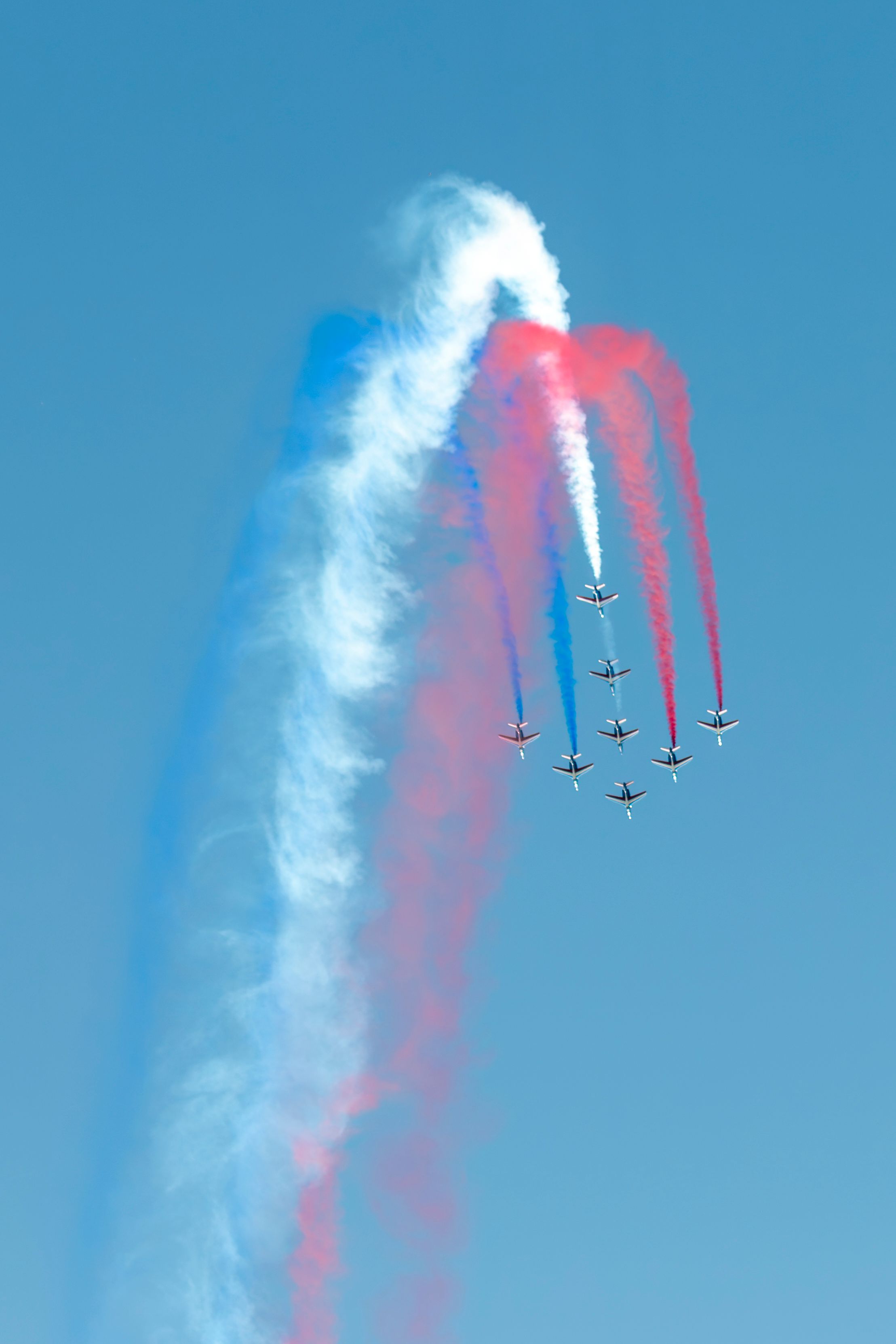 Aerobatic Airshow in Bucharest with Colorful Trails · Free Stock Photo