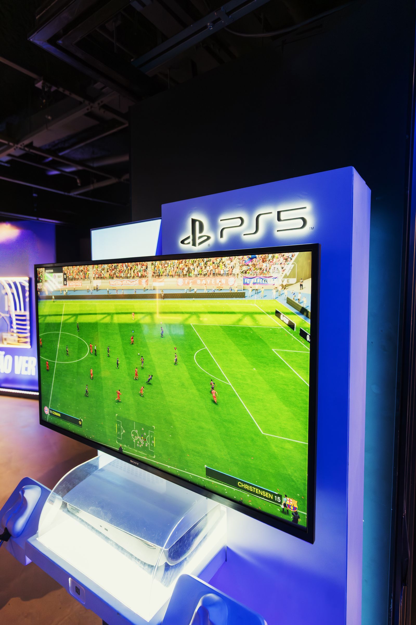 A PlayStation 5 console on display in a store, with the PS5 logo lit up