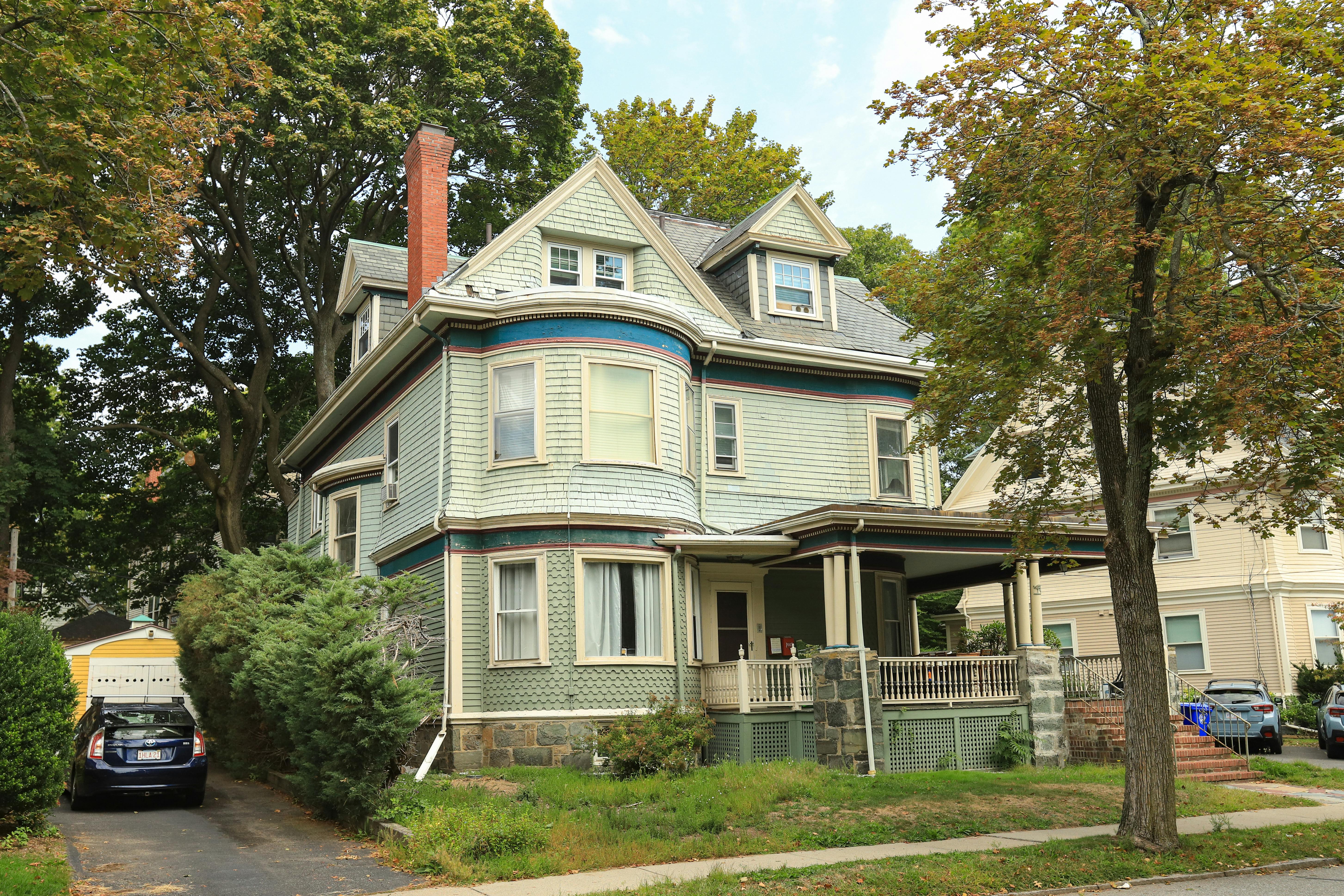 A classic Victorian-style home on a tree-lined street in Wicker Park - Wicker Park apartment buildings