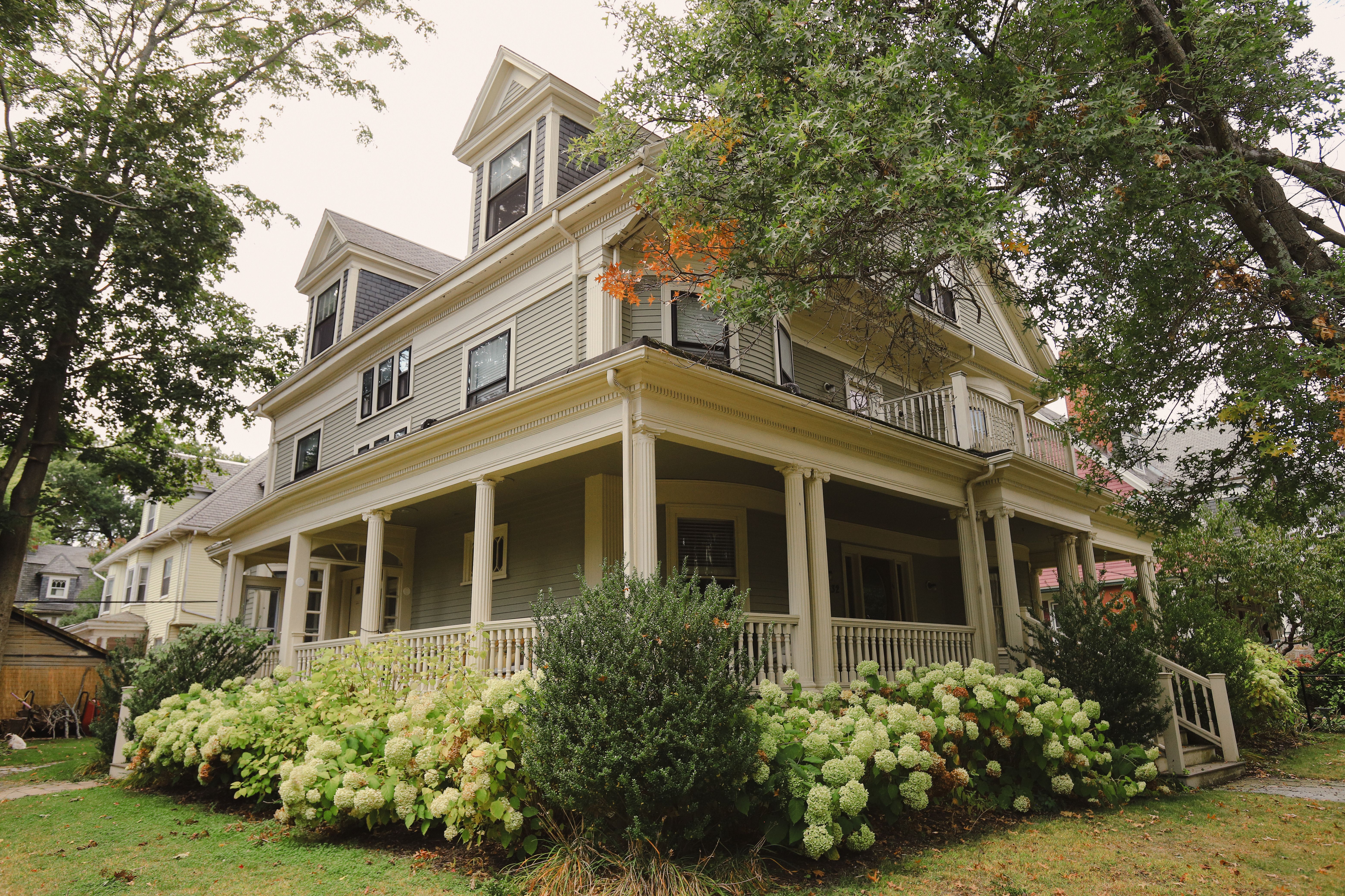 Charming traditional home with a wraparound porch and carefully maintained garden