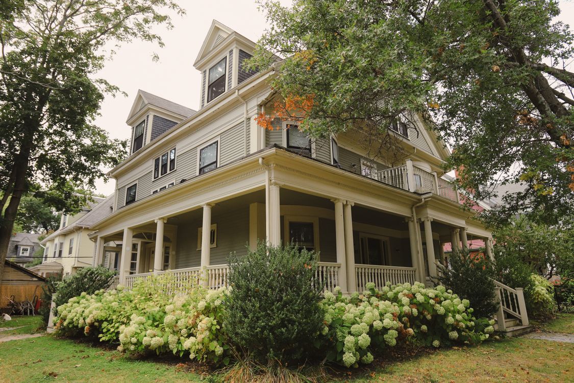 Charming traditional home with a wraparound porch and carefully maintained garden