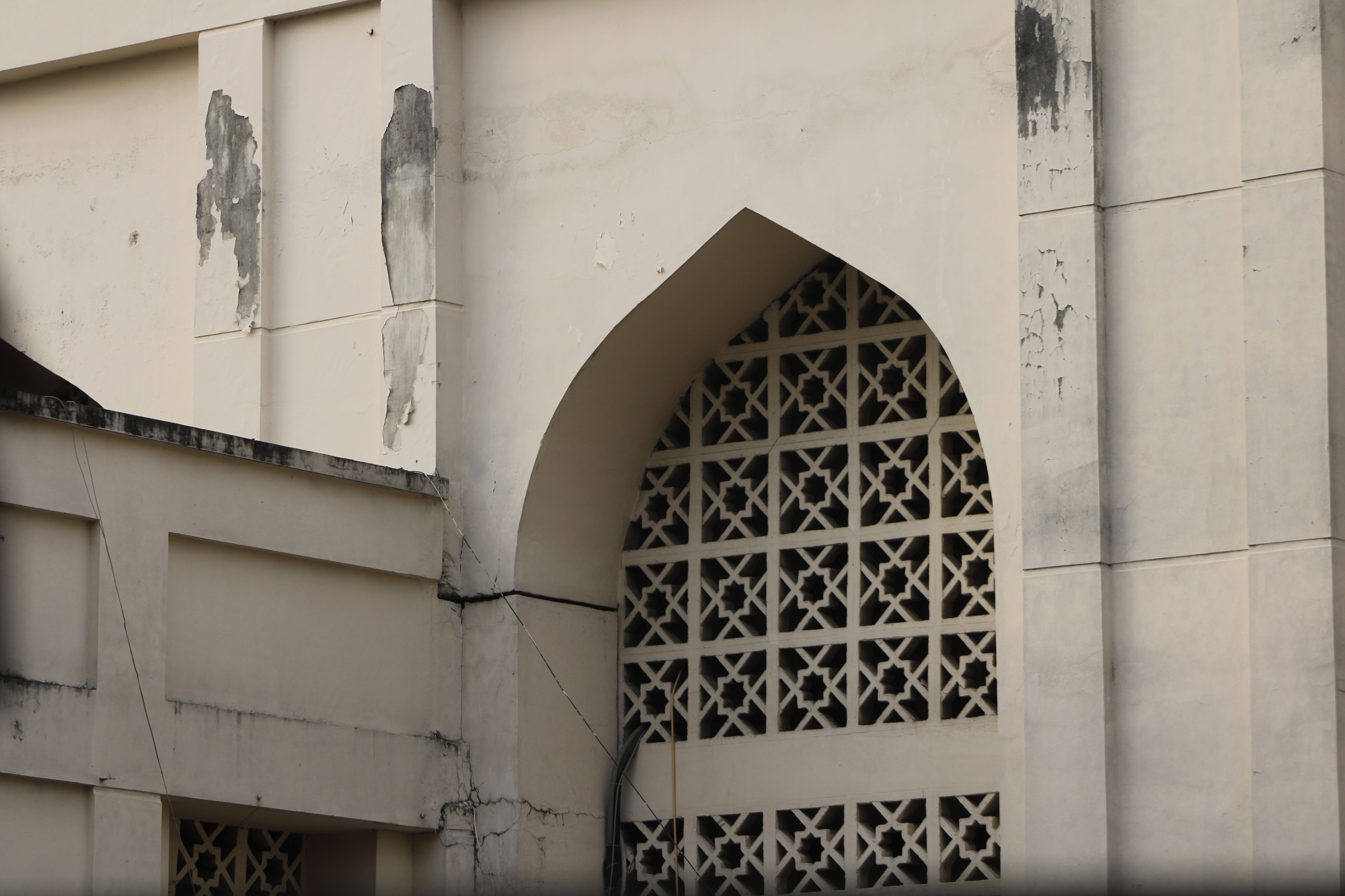 Architectural Detail of Weathered Building Facade · Free Stock Photo