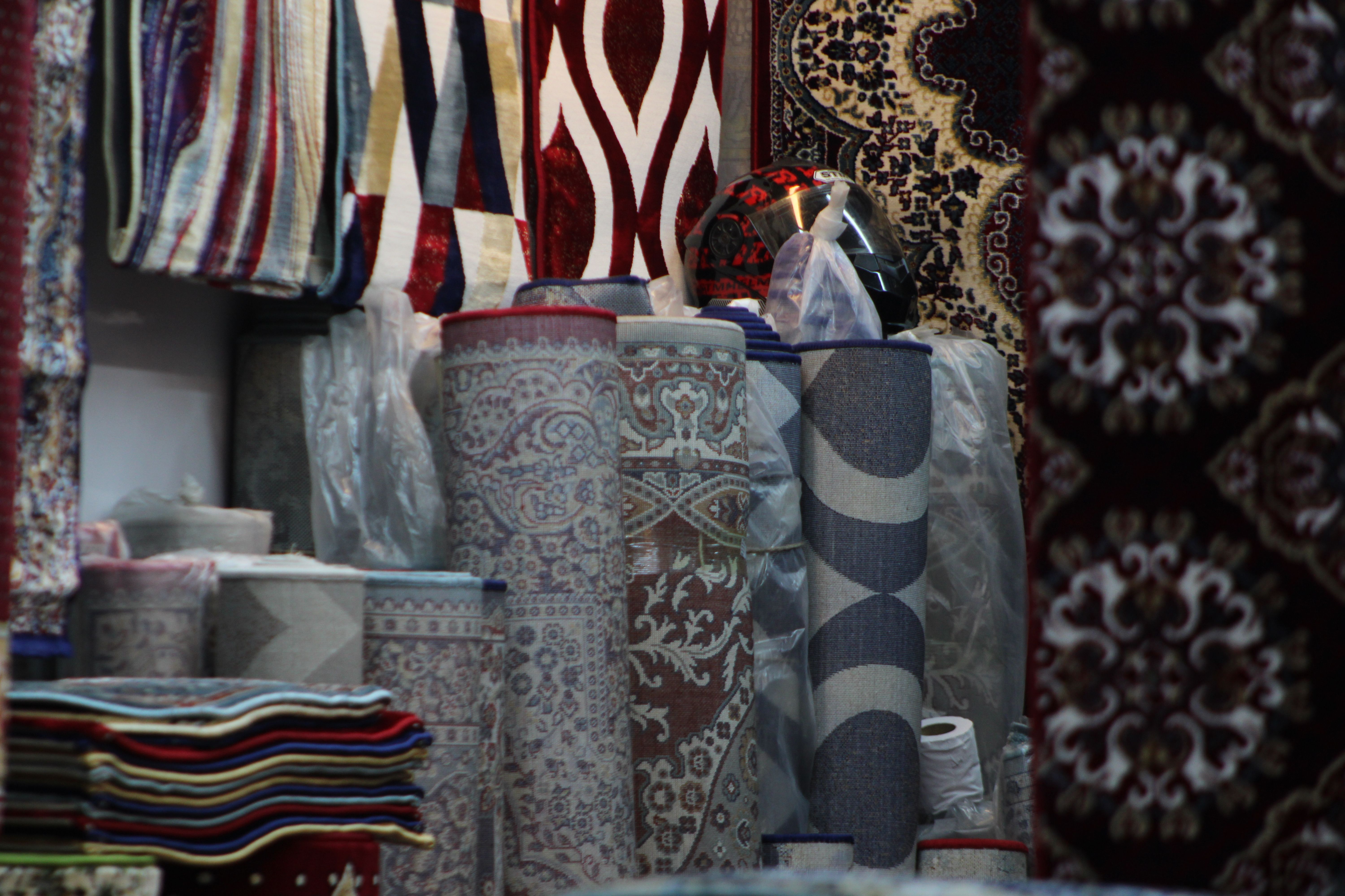 Colorful fabric rolls in market