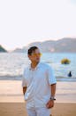 Man in White on Tropical Beach at Sunset
