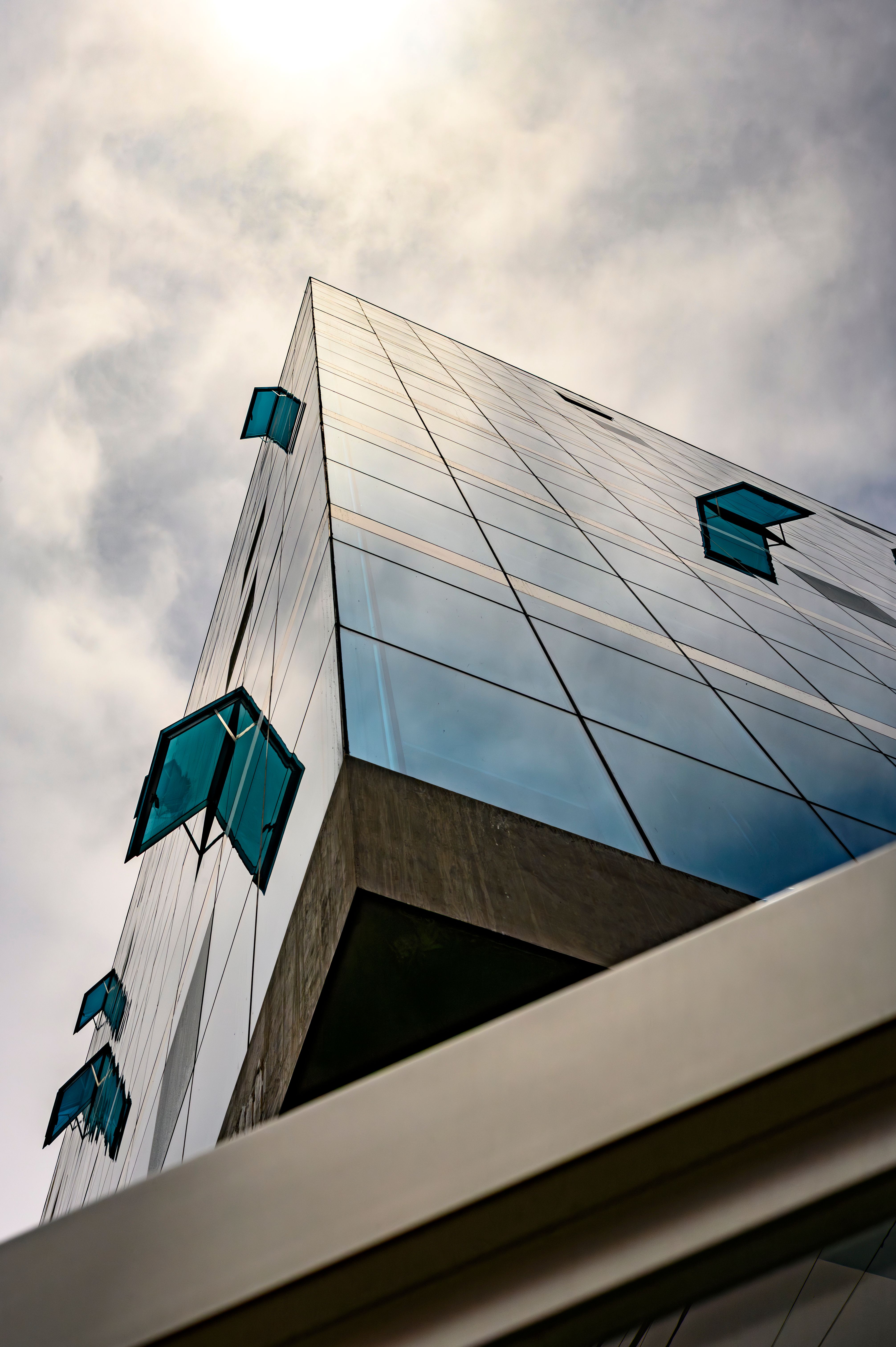 Modern Glass Building with Open Windows · Free Stock Photo