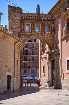 Elegant medieval archway in Valencia's historic city center, showcasing classic architecture.