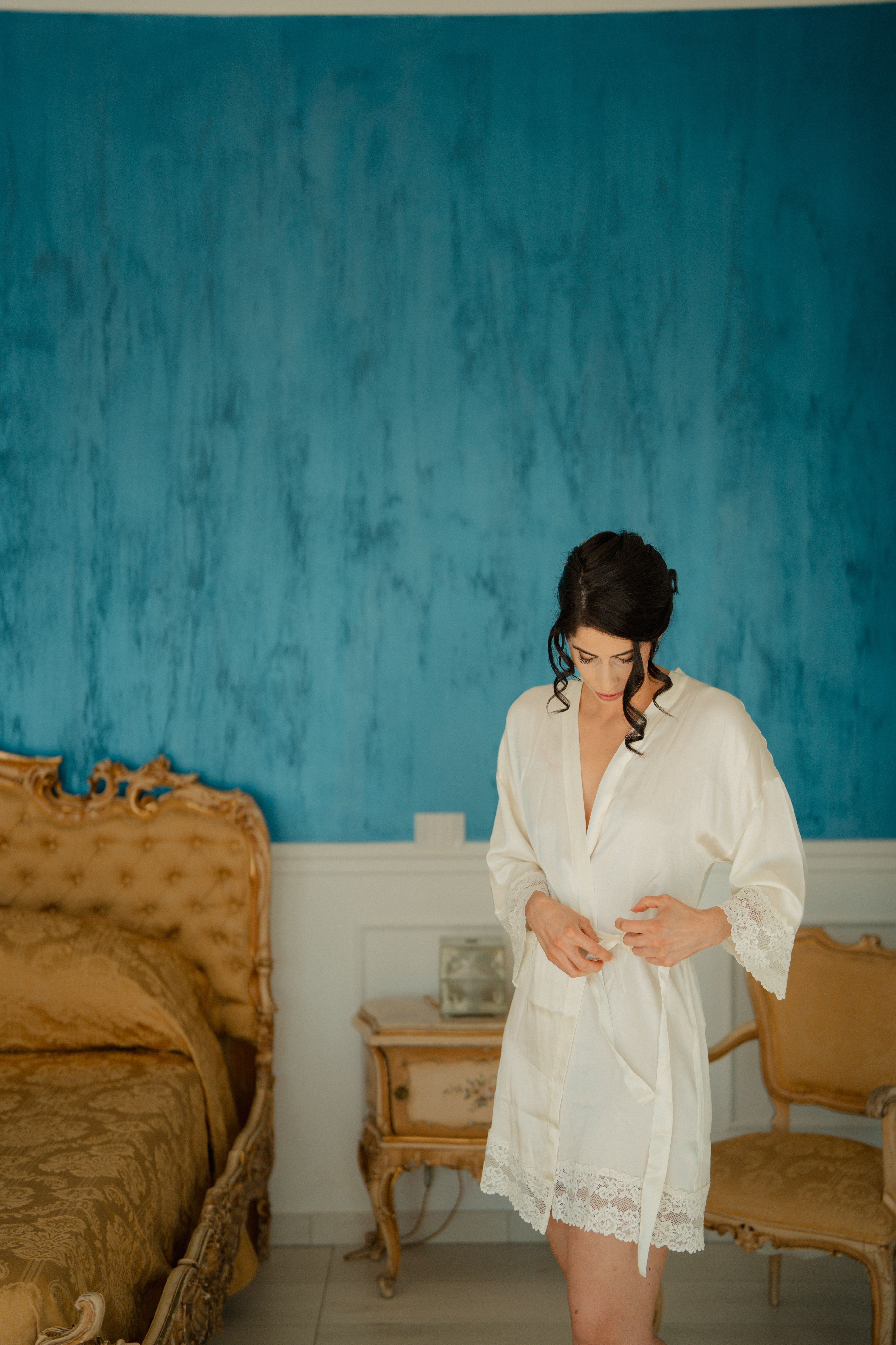 Elegant Woman in Vintage Bedroom Setting · Free Stock Photo