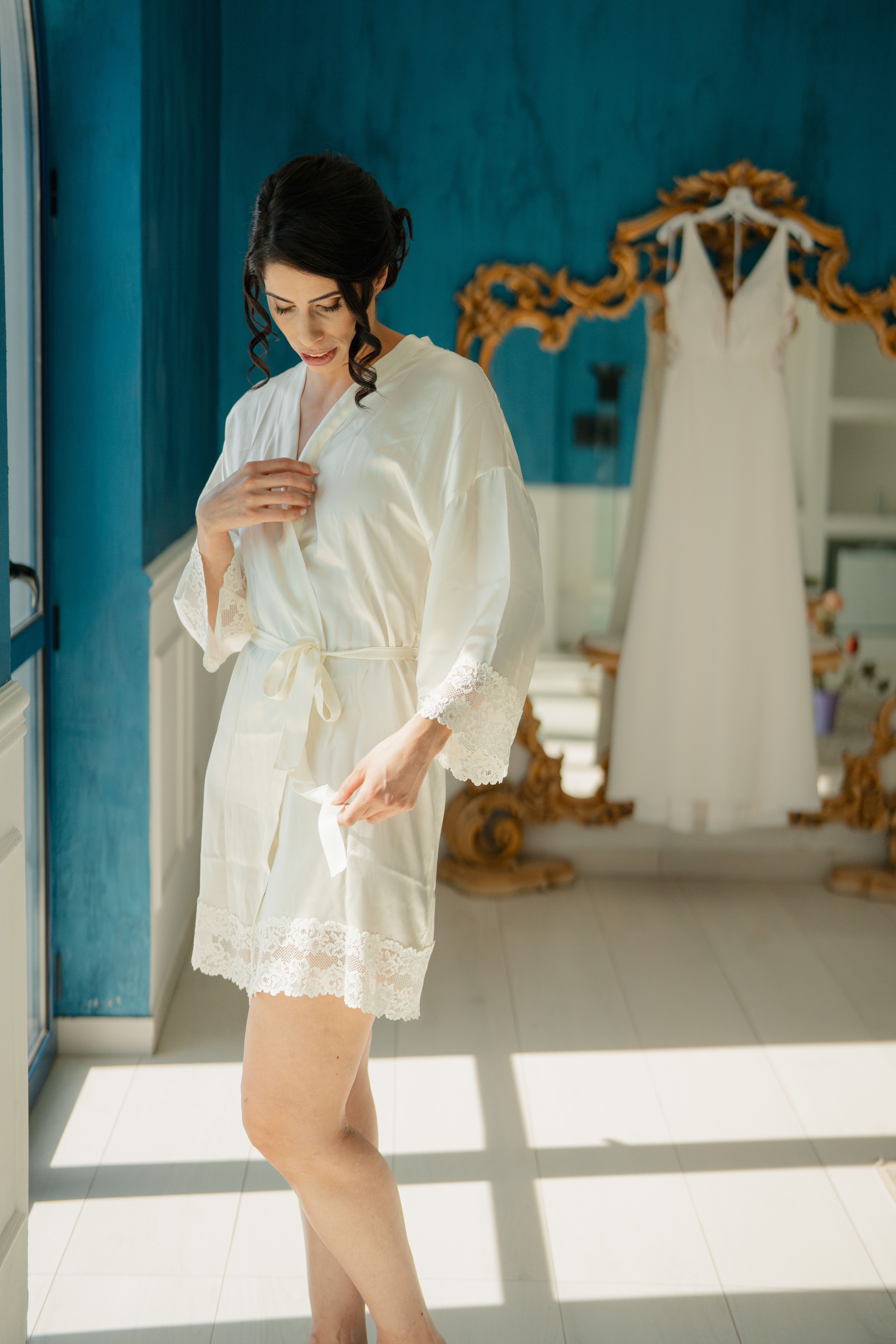 Silk robe and intimates styled in soft daylight