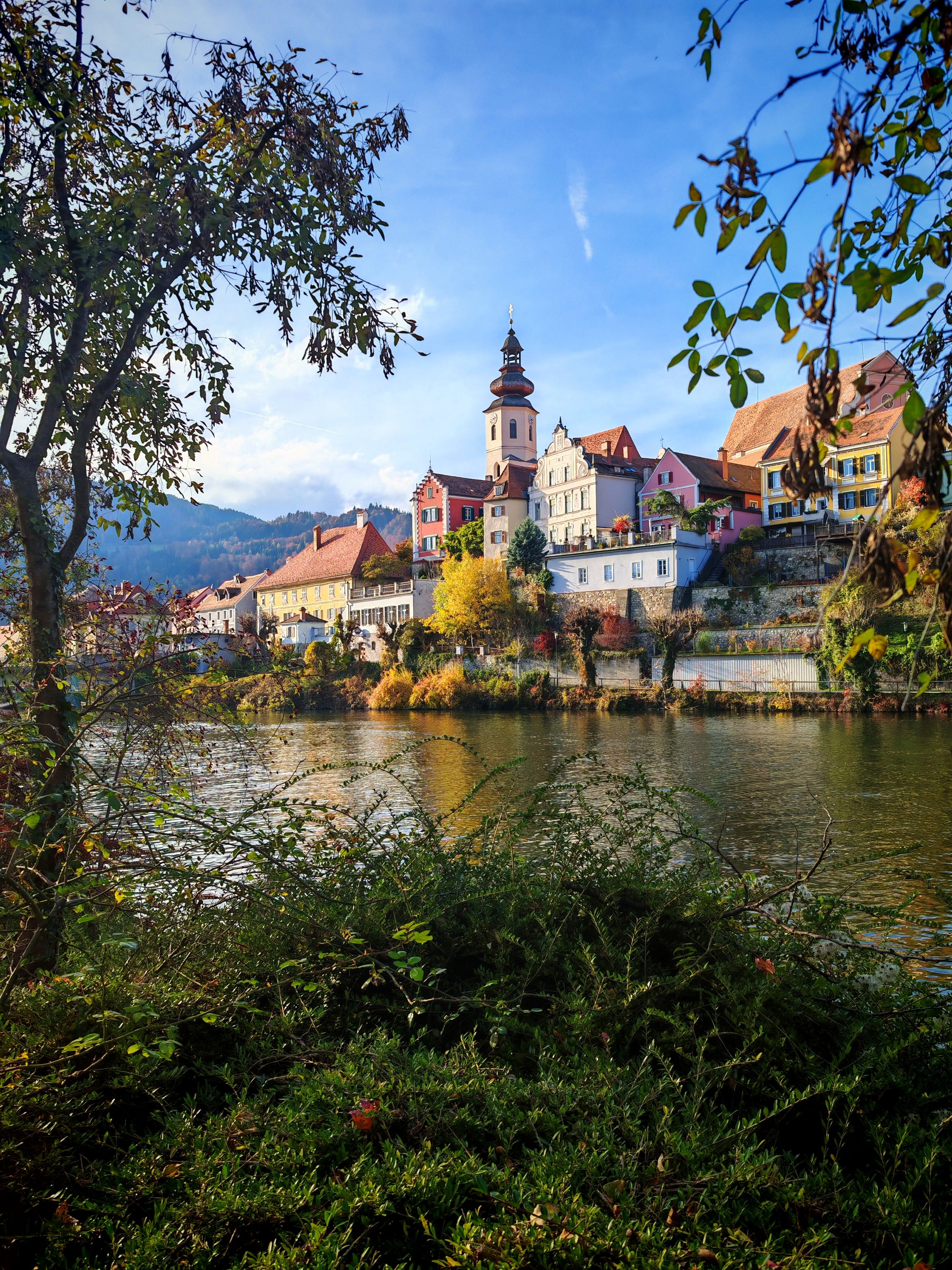 Scenic Riverside View of Charming European Town · Free Stock Photo