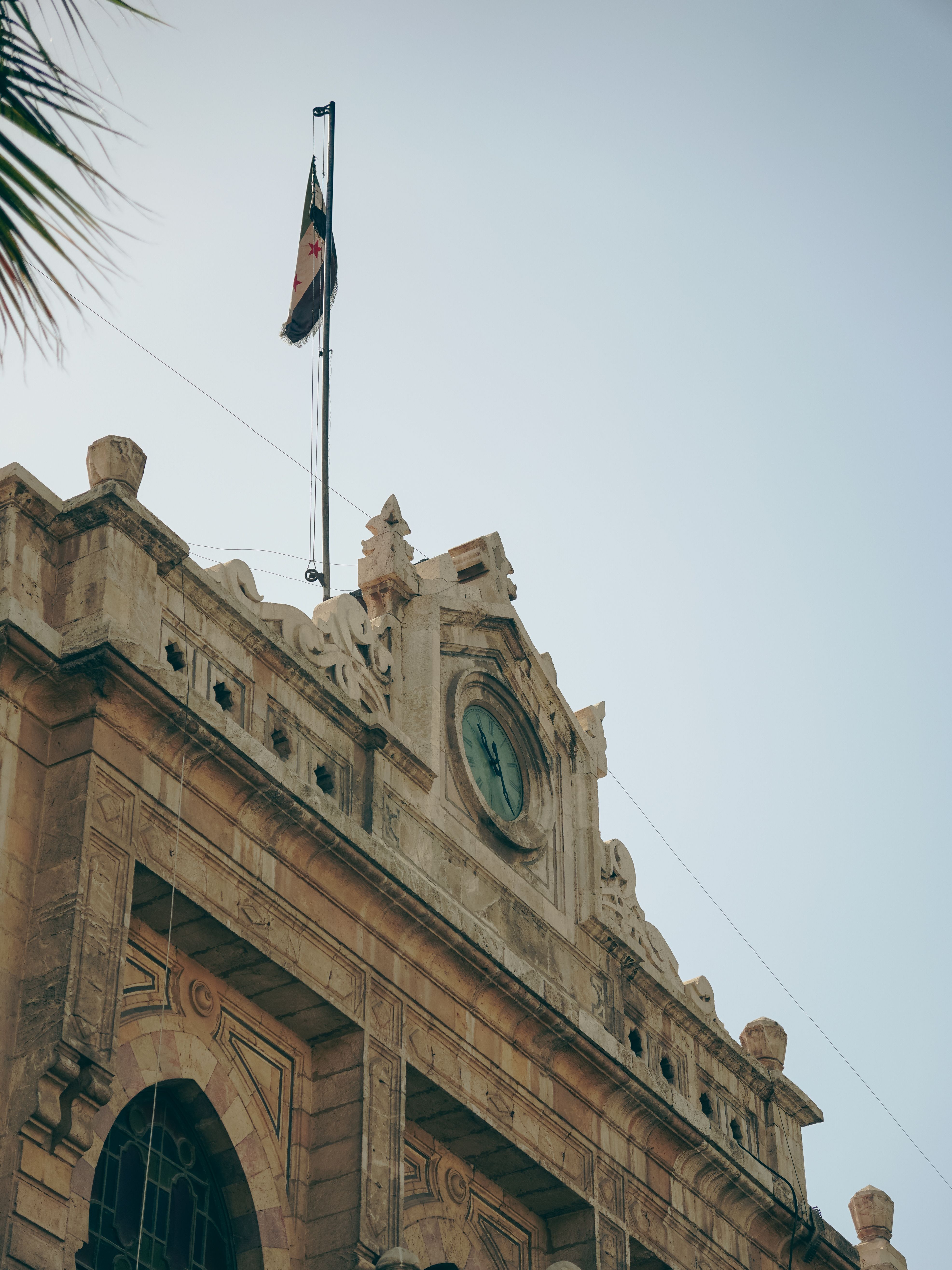 Historic Clock Tower with Syrian Flag in Damascus · Free Stock Photo