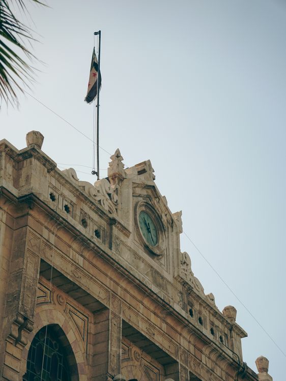 Syrian Clock Historic Clock Tower with Syrian Flag in Damascus · Free Stock Photo