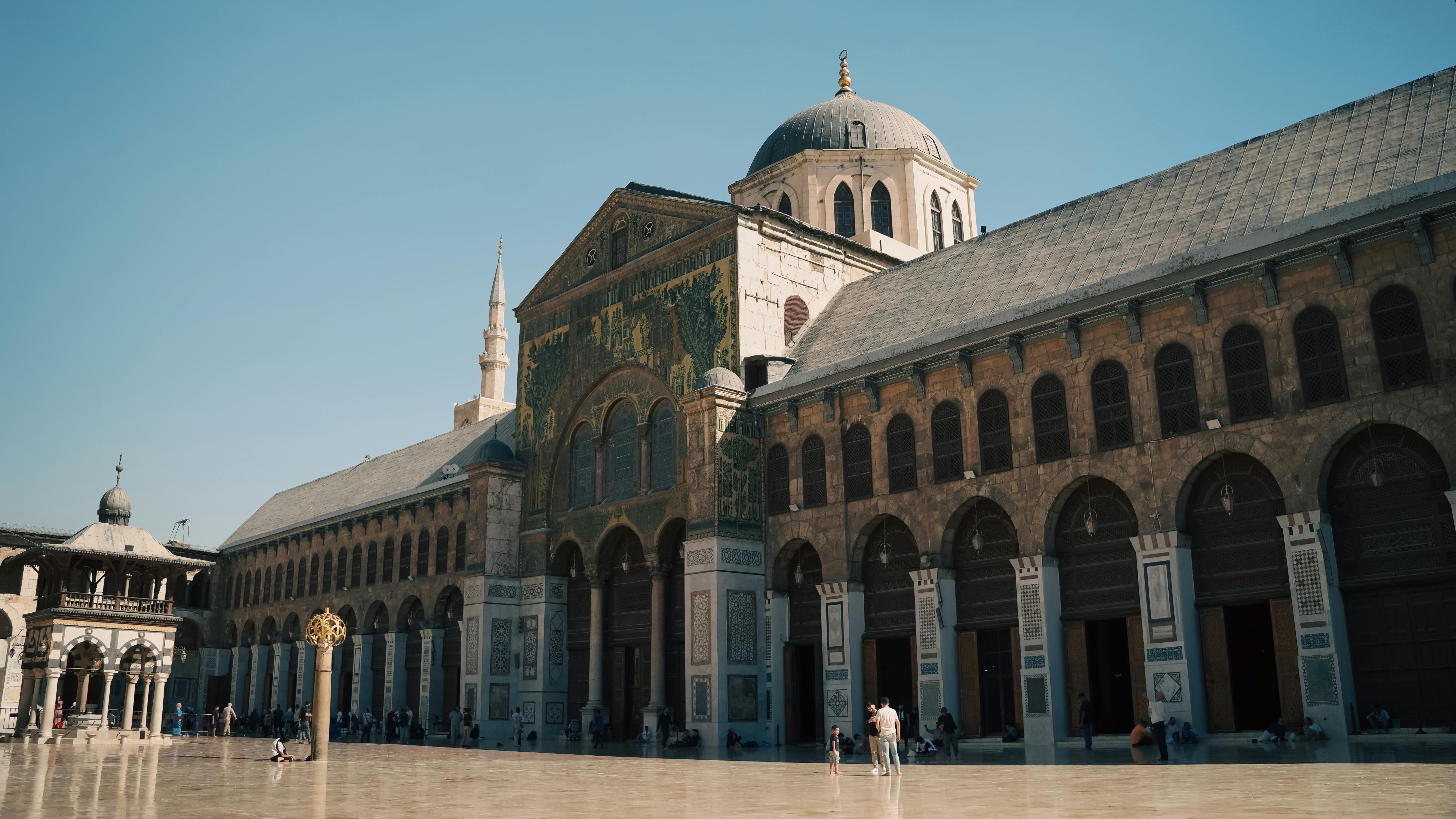 Umayyad Mosque Architecture Courtyard Arched Walkways Gold Mosaics Minarets Central Dome