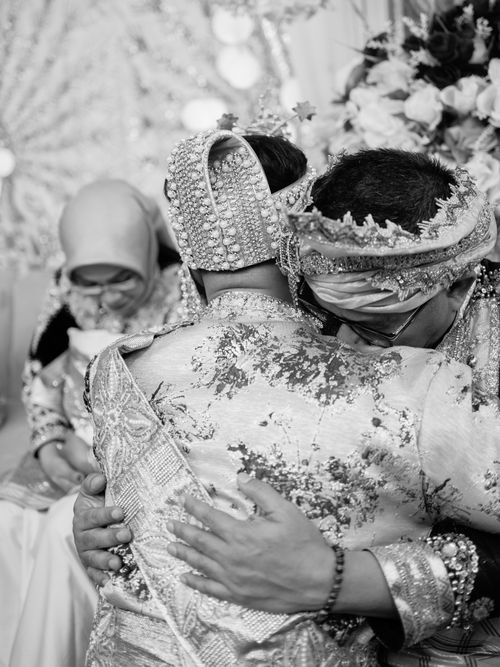 Free Intimate moment during a traditional wedding in Kendari, Indonesia. Stock Photo