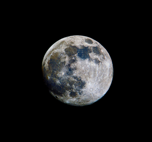 Free Detailed photo of the moon against a black sky, capturing its craters and unique texture. Stock Photo