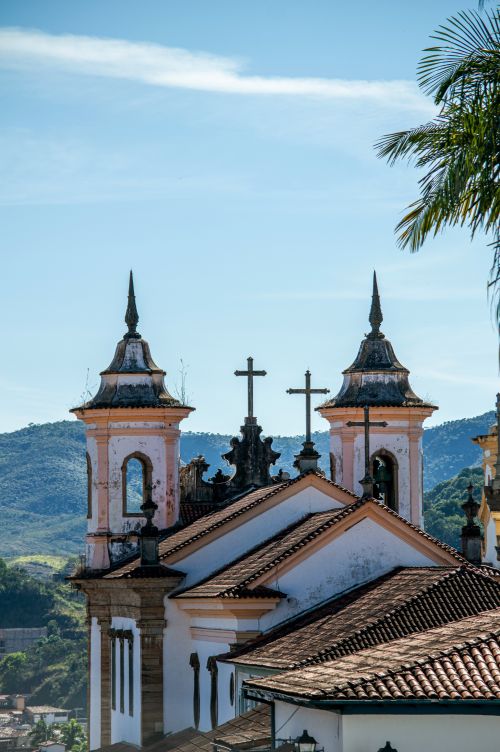 Free A magnificent baroque-style church against a bright blue sky, showcasing religious architecture. Stock Photo