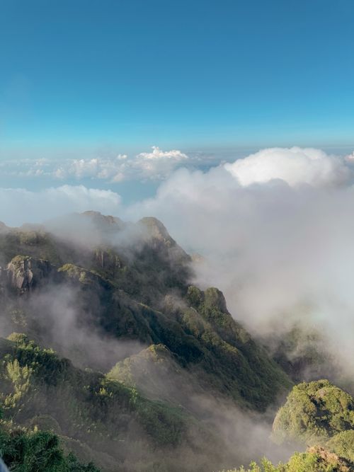 Free Stunning cloud-covered mountains in Lào Cai, captured during the day. Stock Photo