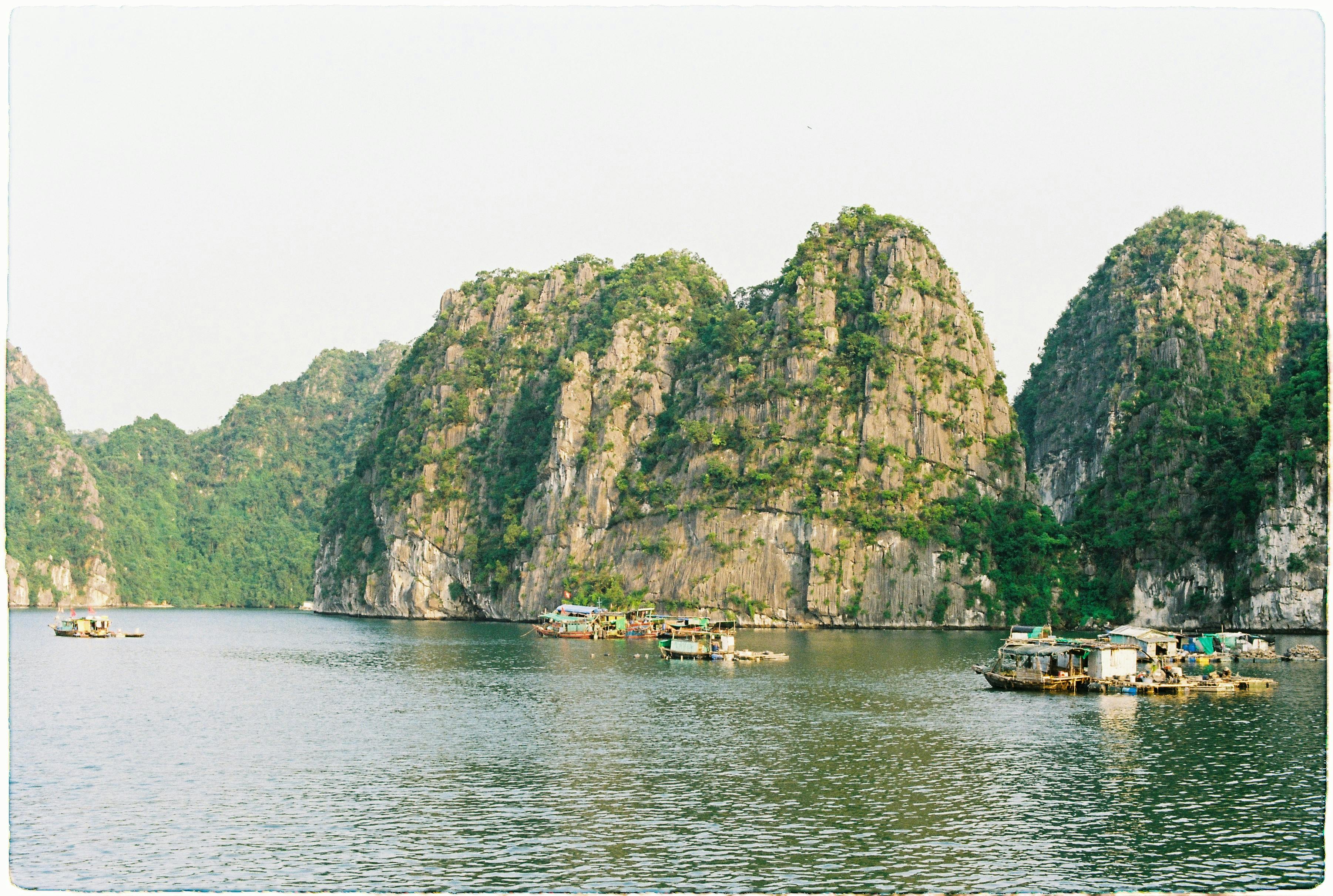 Ha Long Bay boats and limestone islands