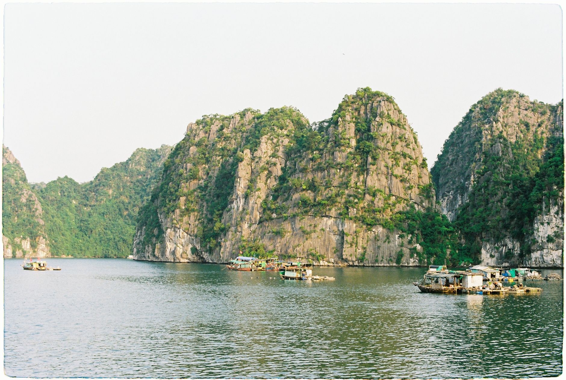 Ha Long Bay boats and limestone islands