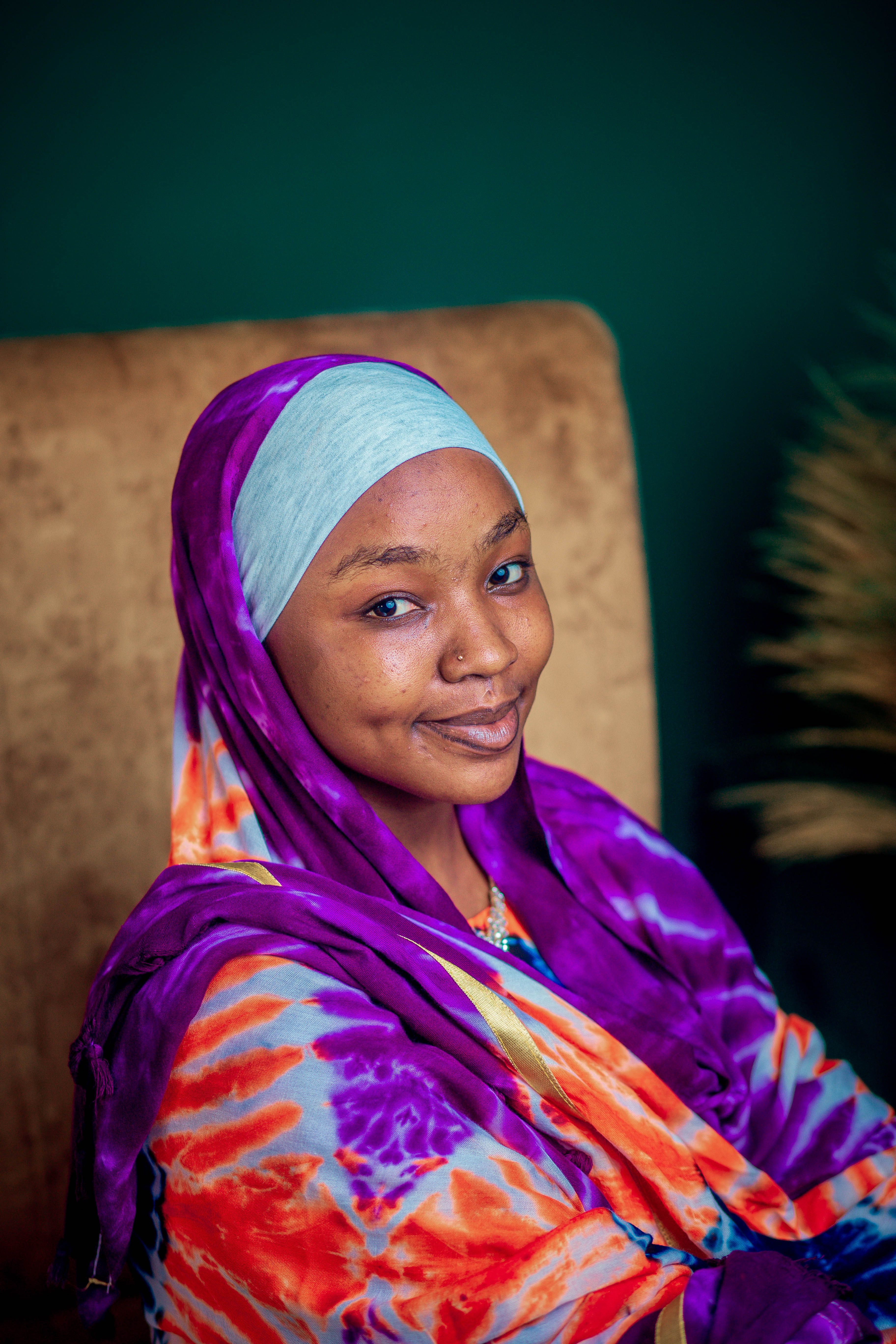 Portrait of Smiling Woman in Colorful Hijab · Free Stock Photo