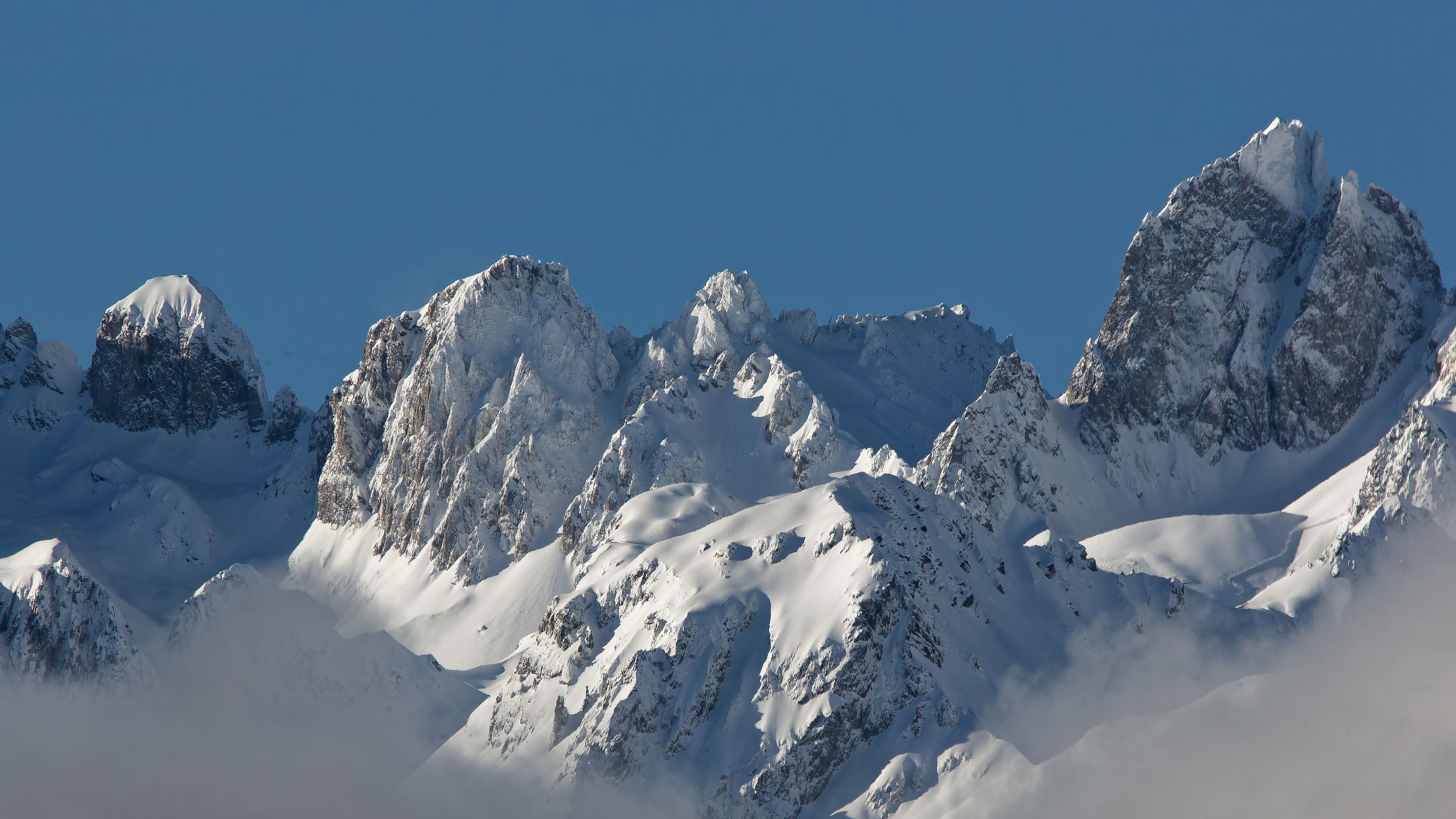 Majestic Snow-Covered Mountain Peaks Under Clear Blue Sky · Free Stock ...