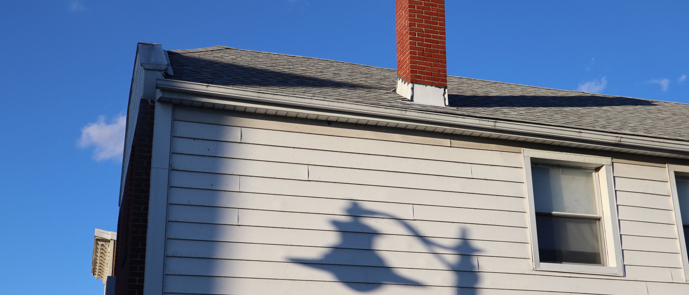 House Painting in Chiswick — quality trade paint going on in two coats