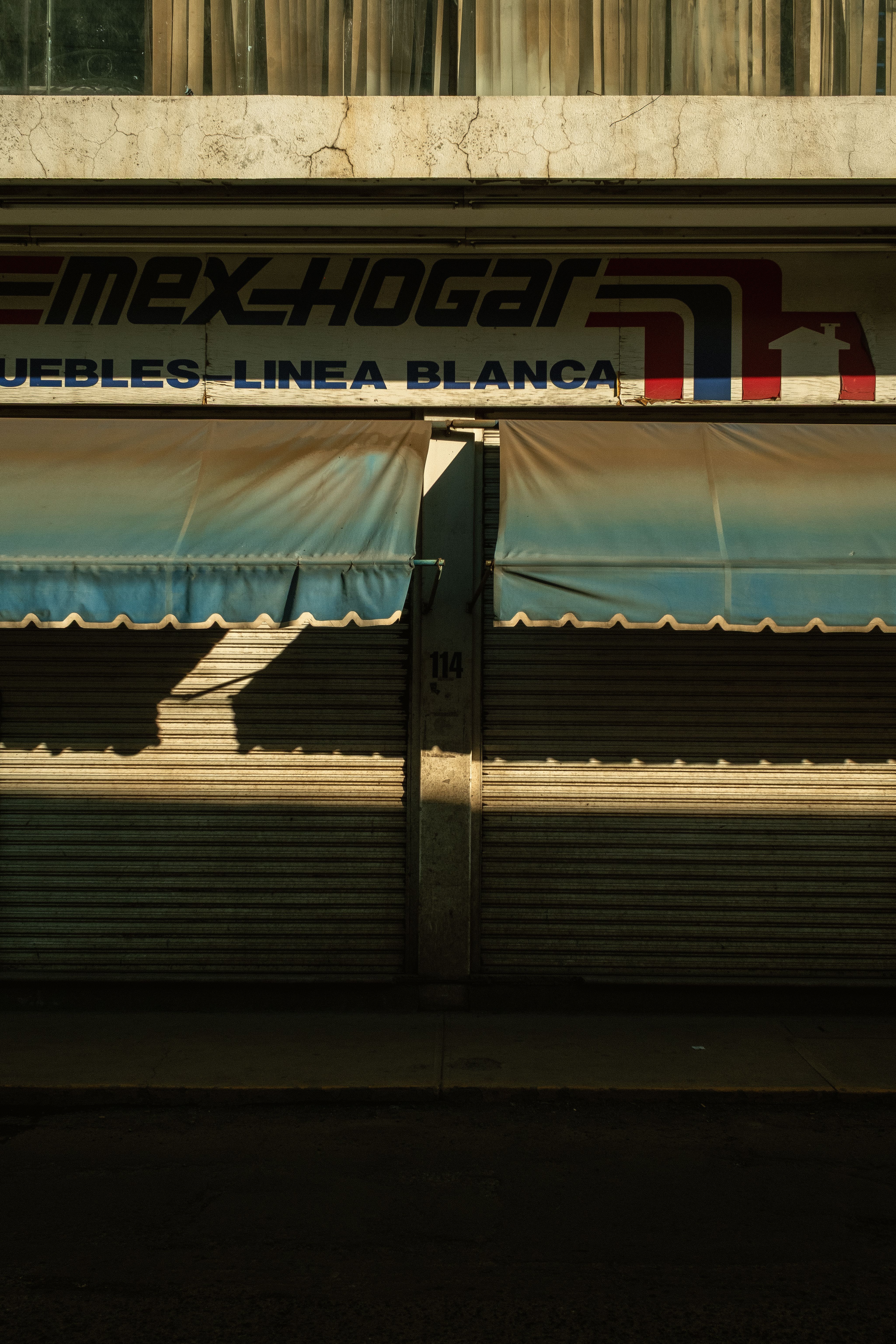 Vintage Closed Mexican Storefront with Awning · Free Stock Photo