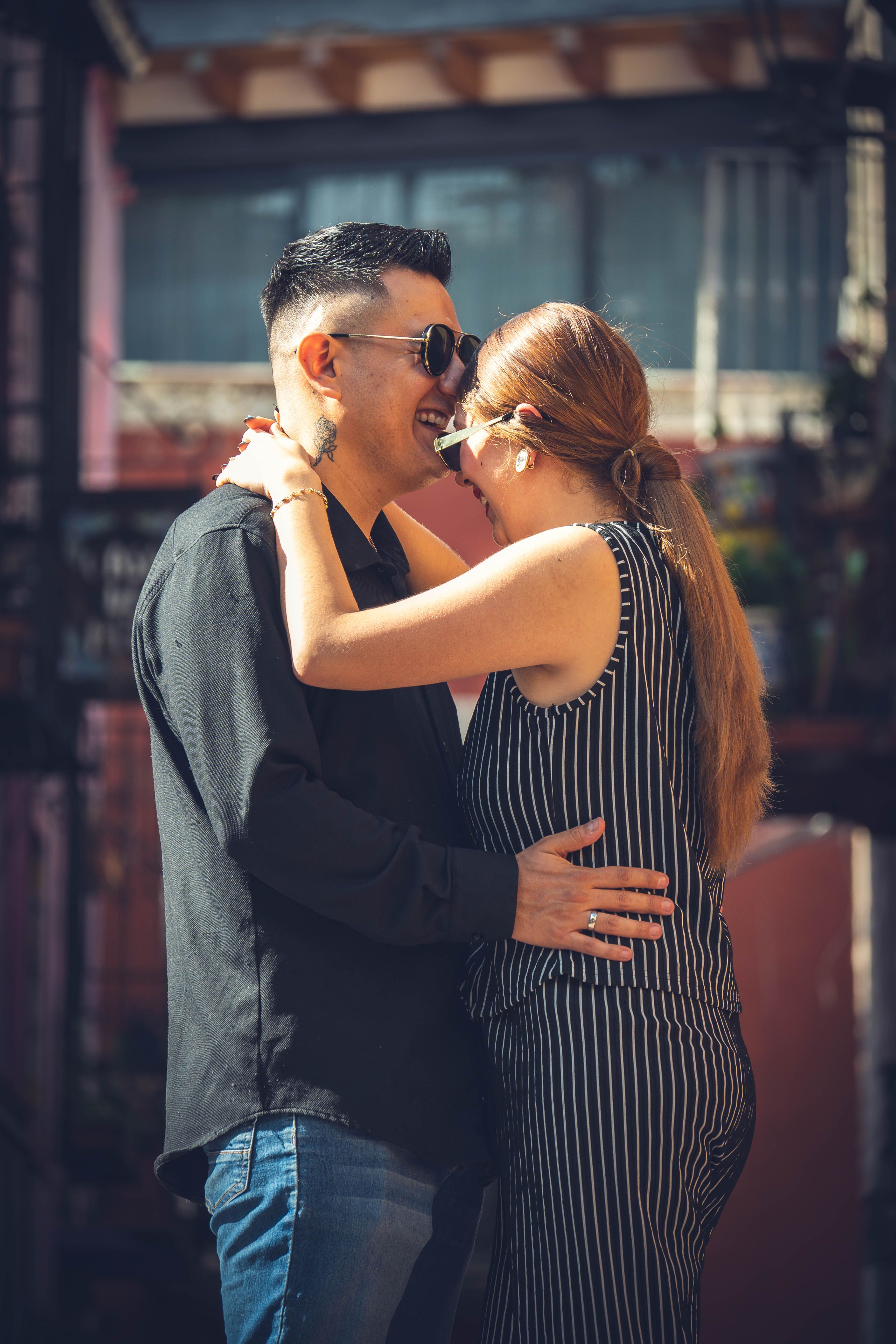 Man and Woman Walking on Street While Holding Hands · Free Stock Photo