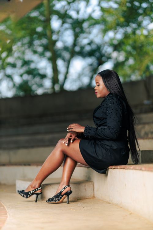 black woman in black dress Elegant Woman in Black Dress Portrait Free Stock Photo