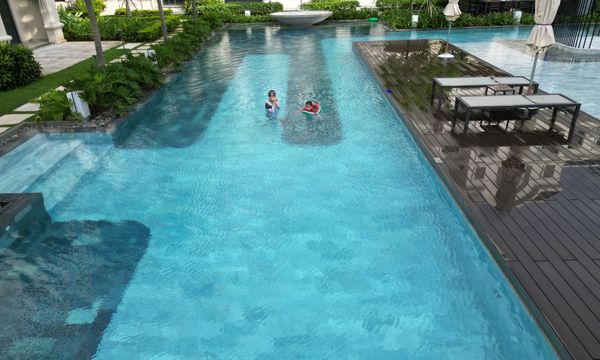 Resort swimming pool with children
