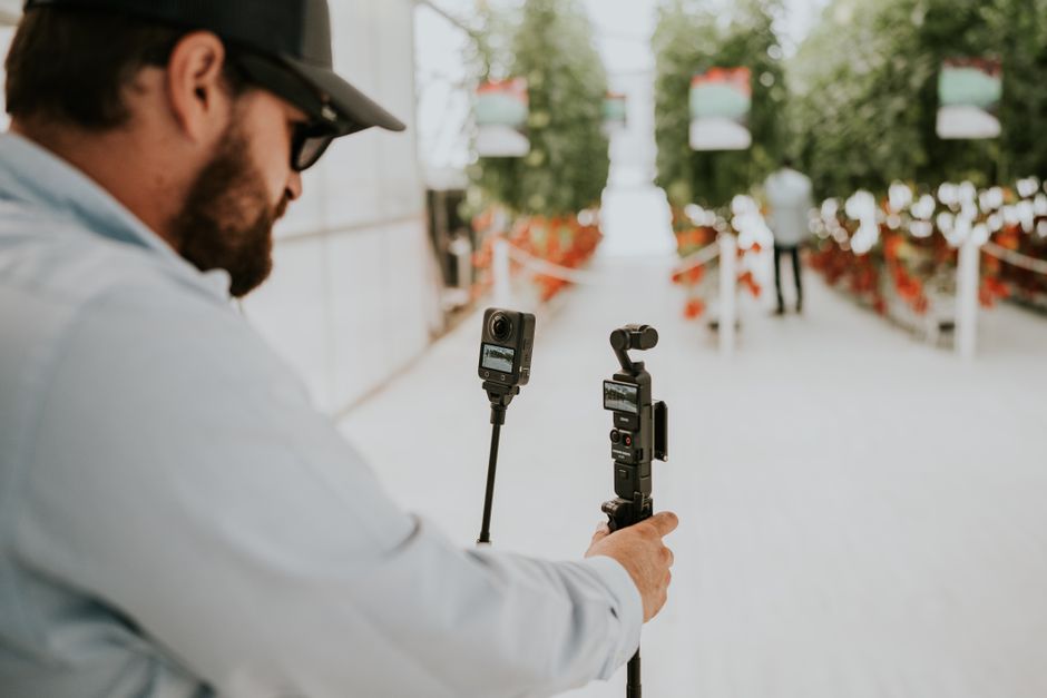 Technician filming a quick video tip on a smartphone Technician filming a quick video tip on a smartphone