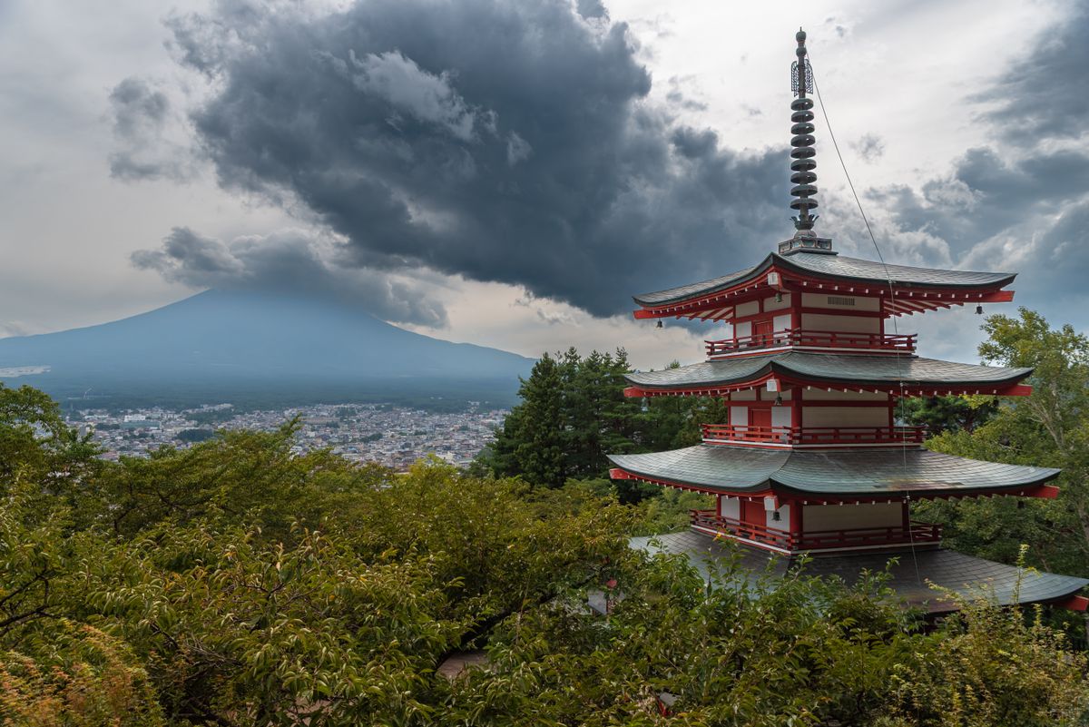 Chureito Pagoda overlooks Mount Fuji under dramatic skies