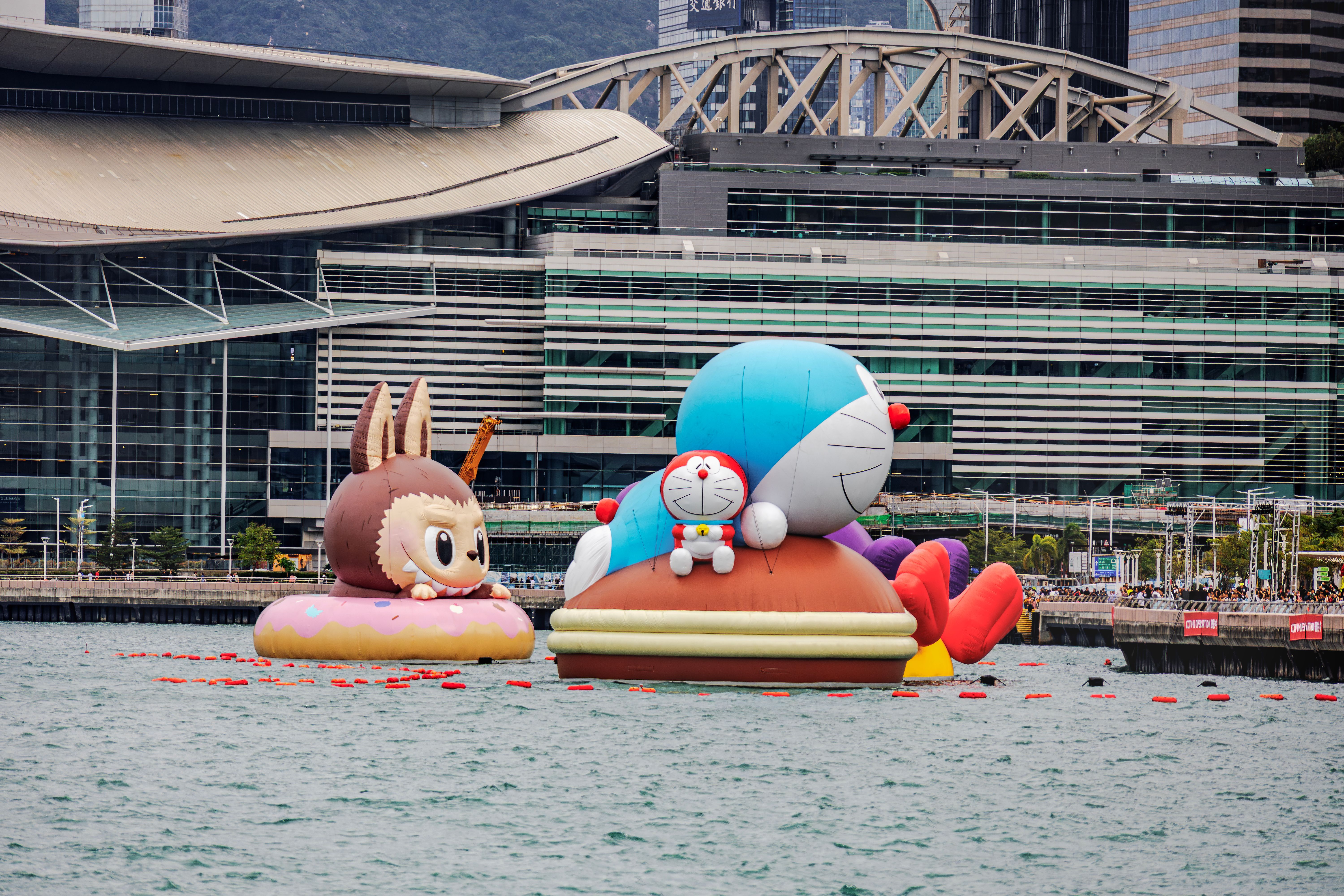 Large Inflatable Cartoon Characters at Waterfront · Free Stock Photo