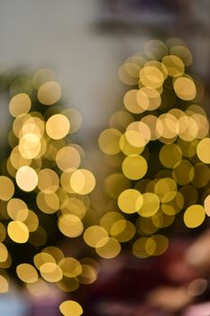 Blurred golden bokeh lights creating a festive holiday atmosphere.