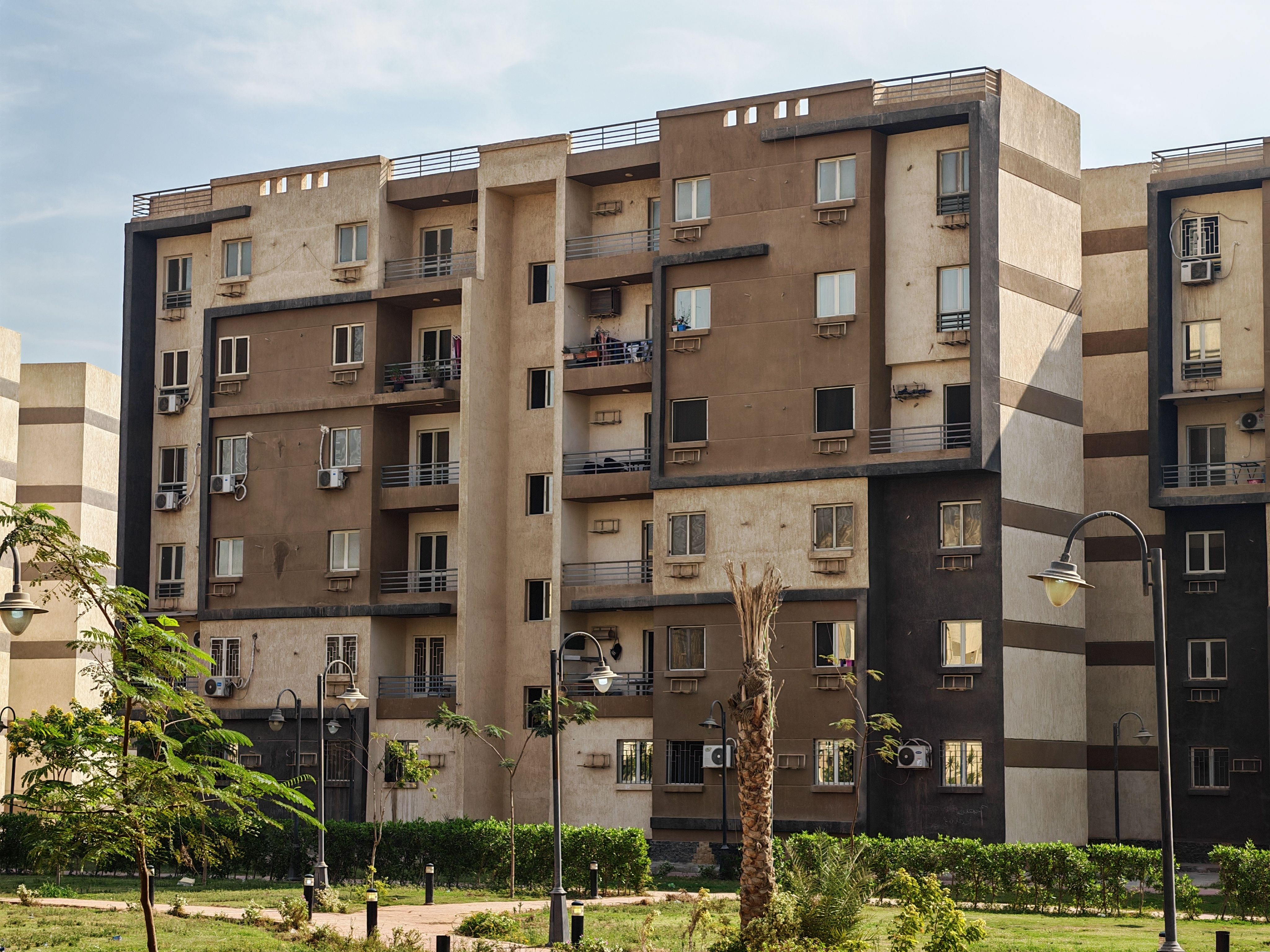 Fresh Look at Modern Apartment Building With Garden View