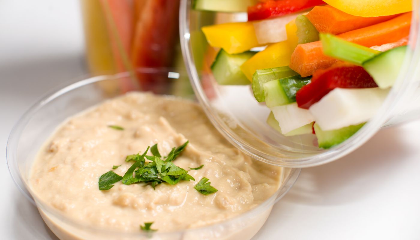 healthy fridge essentials — Colorful Veggie Sticks with Creamy Hummus Dip · Free. Photo: Pexels