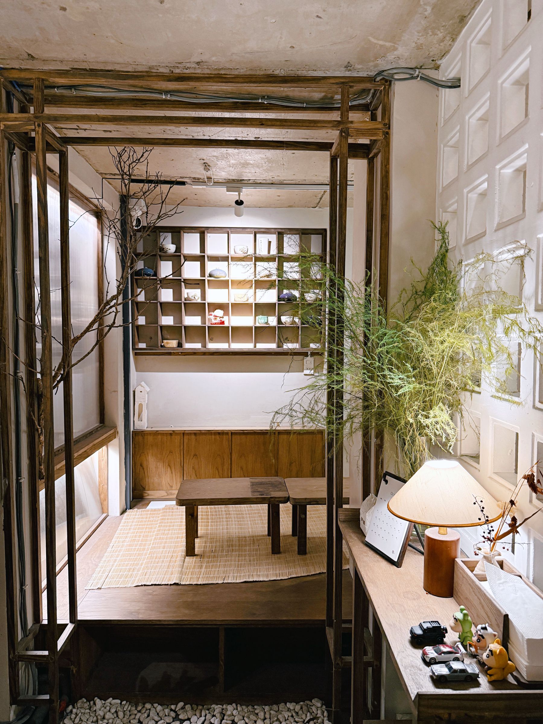 Warm timber interior with a quiet palette and natural furnishings