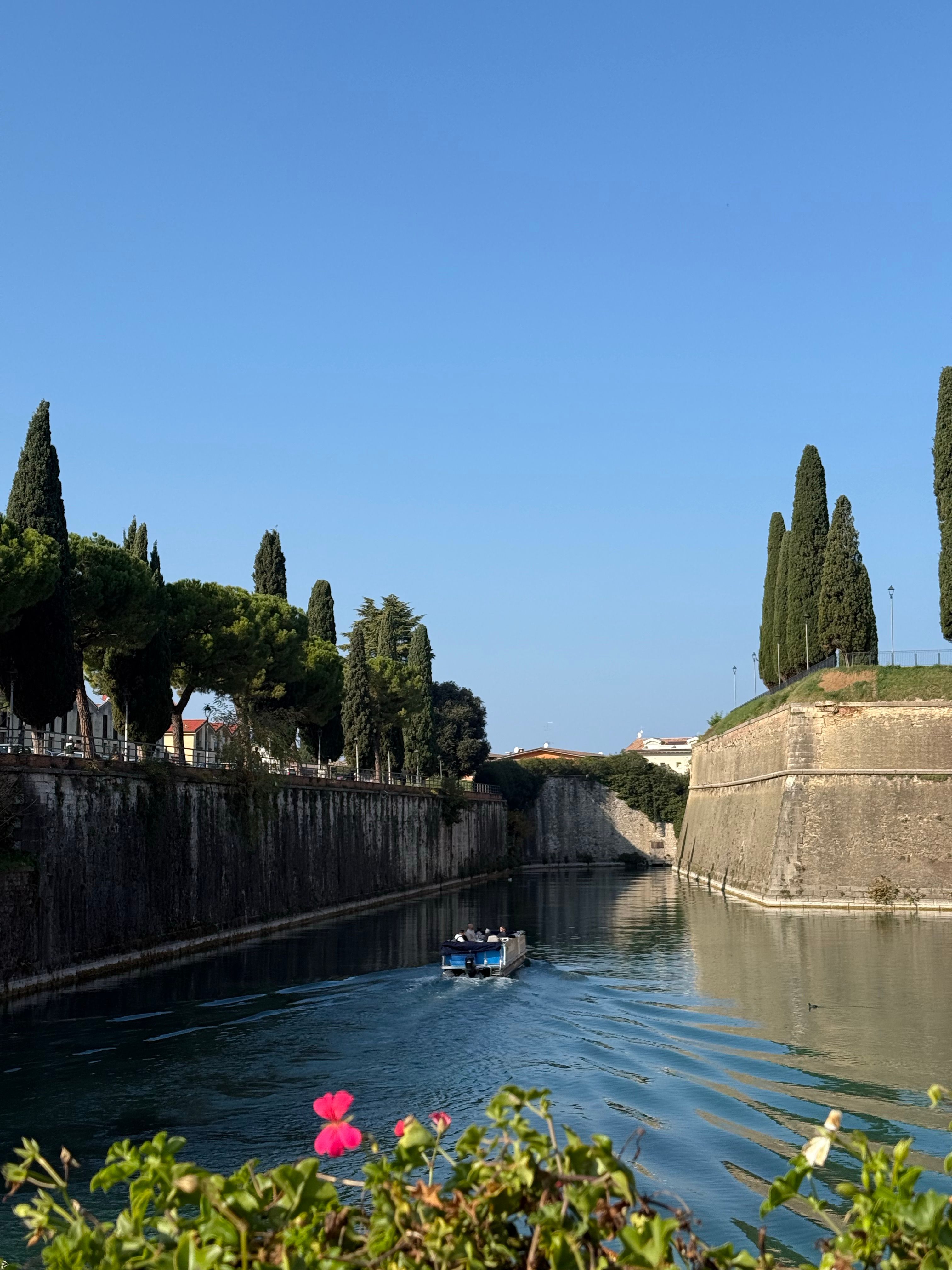 Scenic Boat Ride in Italian Canal · Free Stock Photo