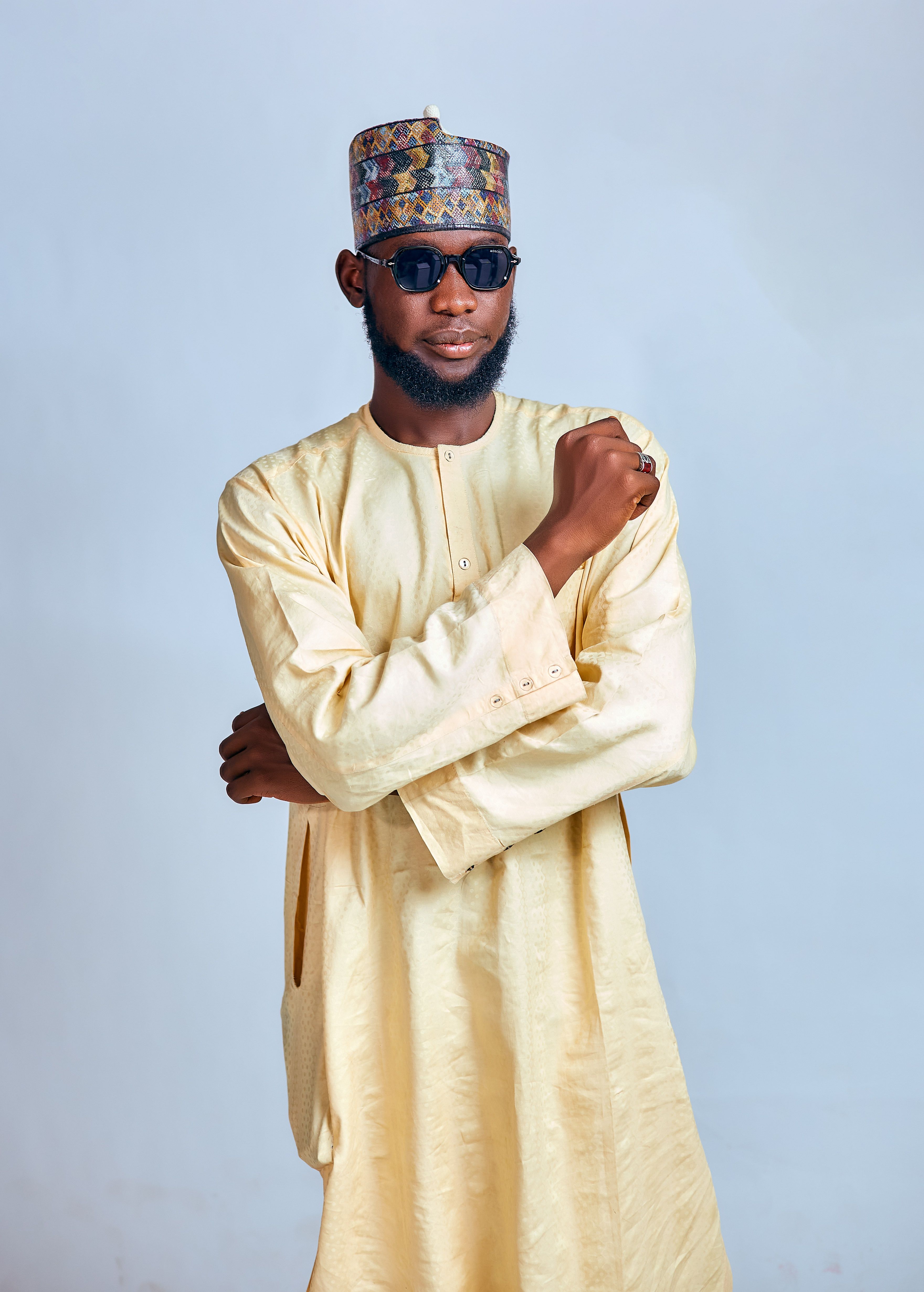 Stylish African Man in Traditional Attire Posing