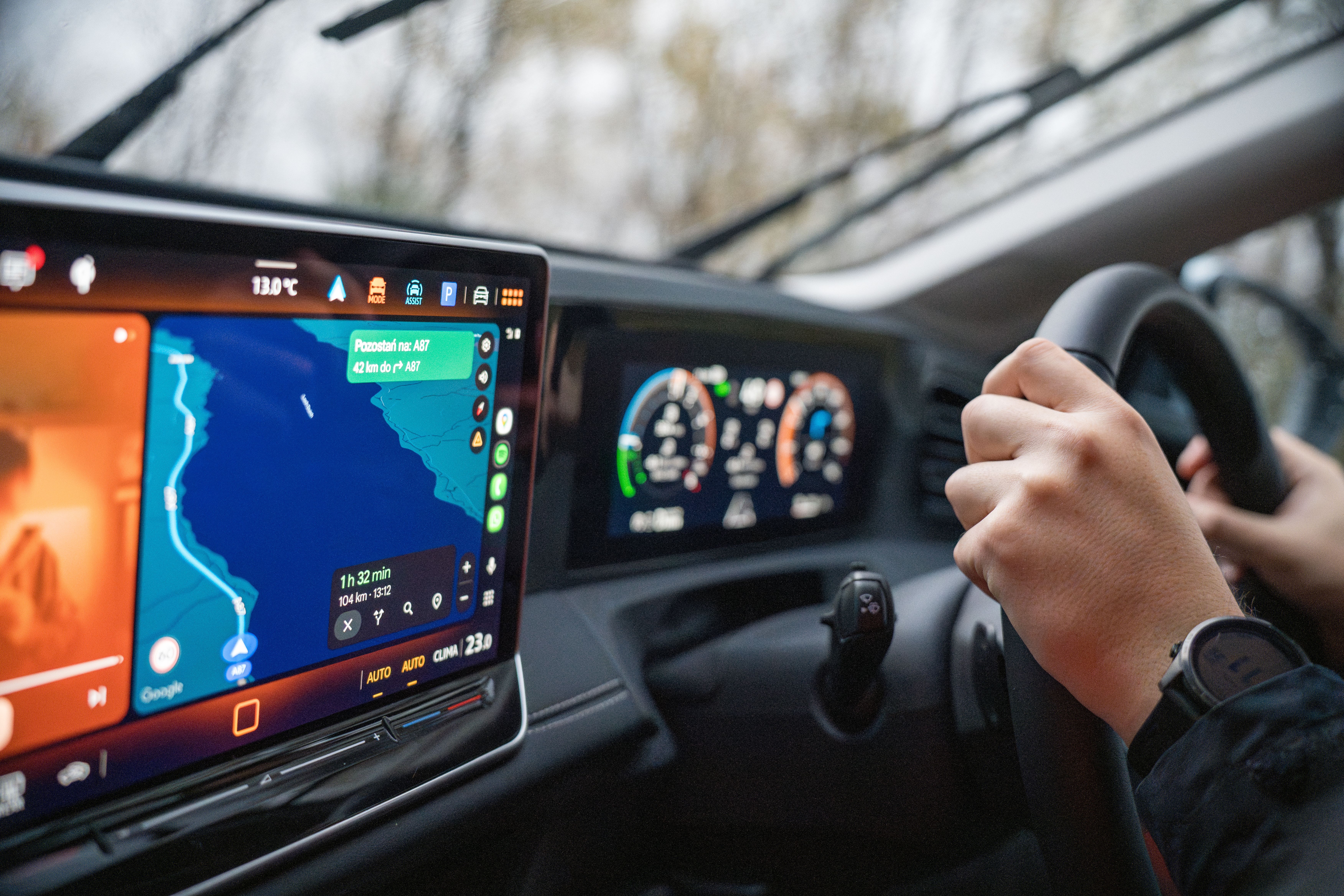 Driving with GPS navigation on car dashboard · Free Stock Photo